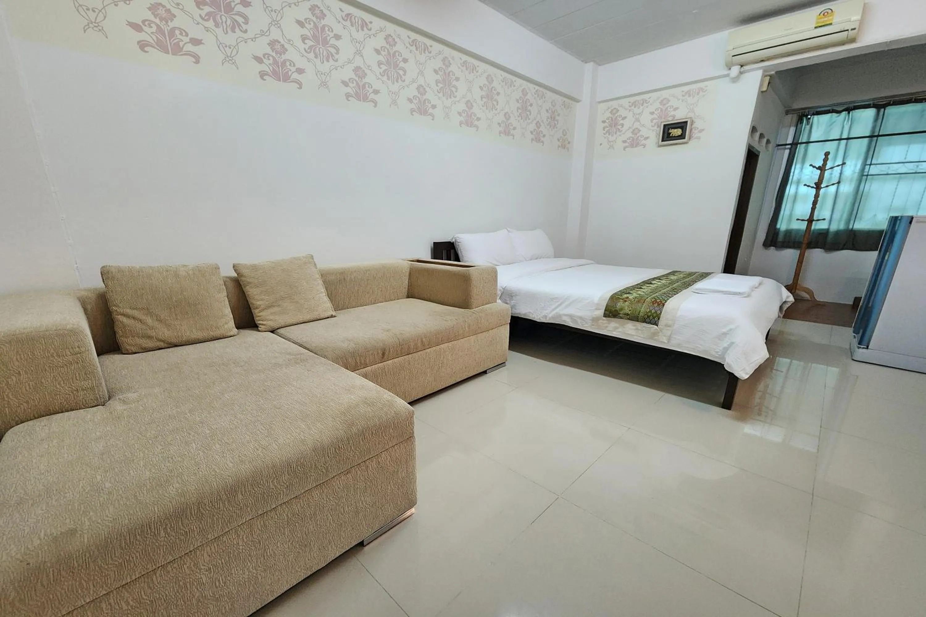 Bed in Green Apartment Kaset