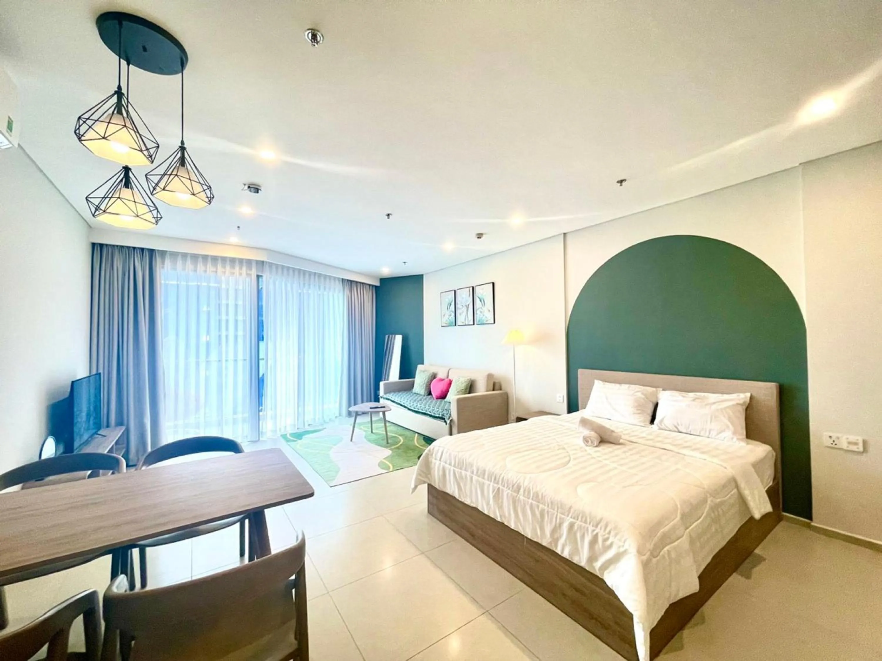 Bed in The Sóng Apartment Vũng Tàu - Sophia's House