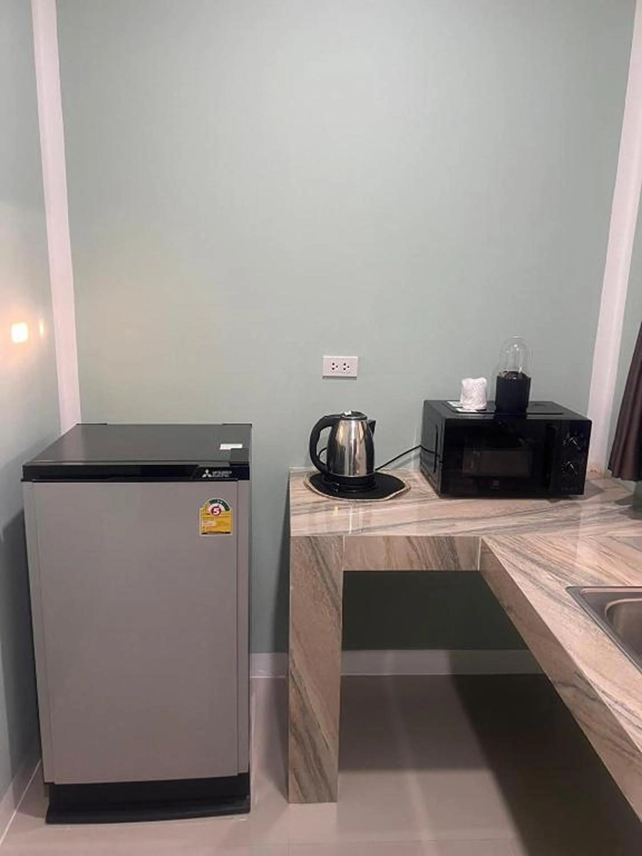 Kitchen or kitchenette in J & Ariya Hotel Near Samui Airport and Koh Phangan Pier