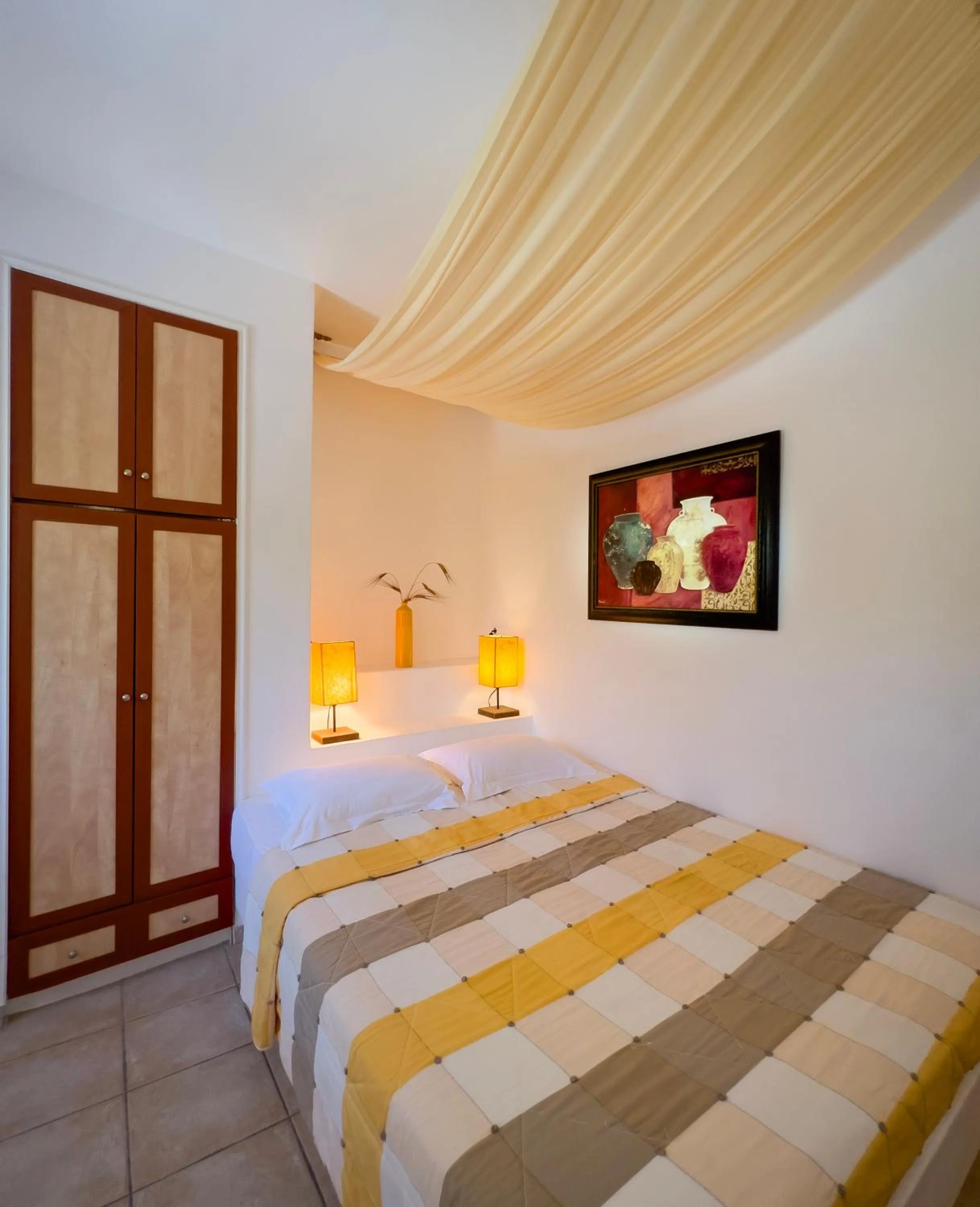 Bed in Chora Resort Hotel & Spa