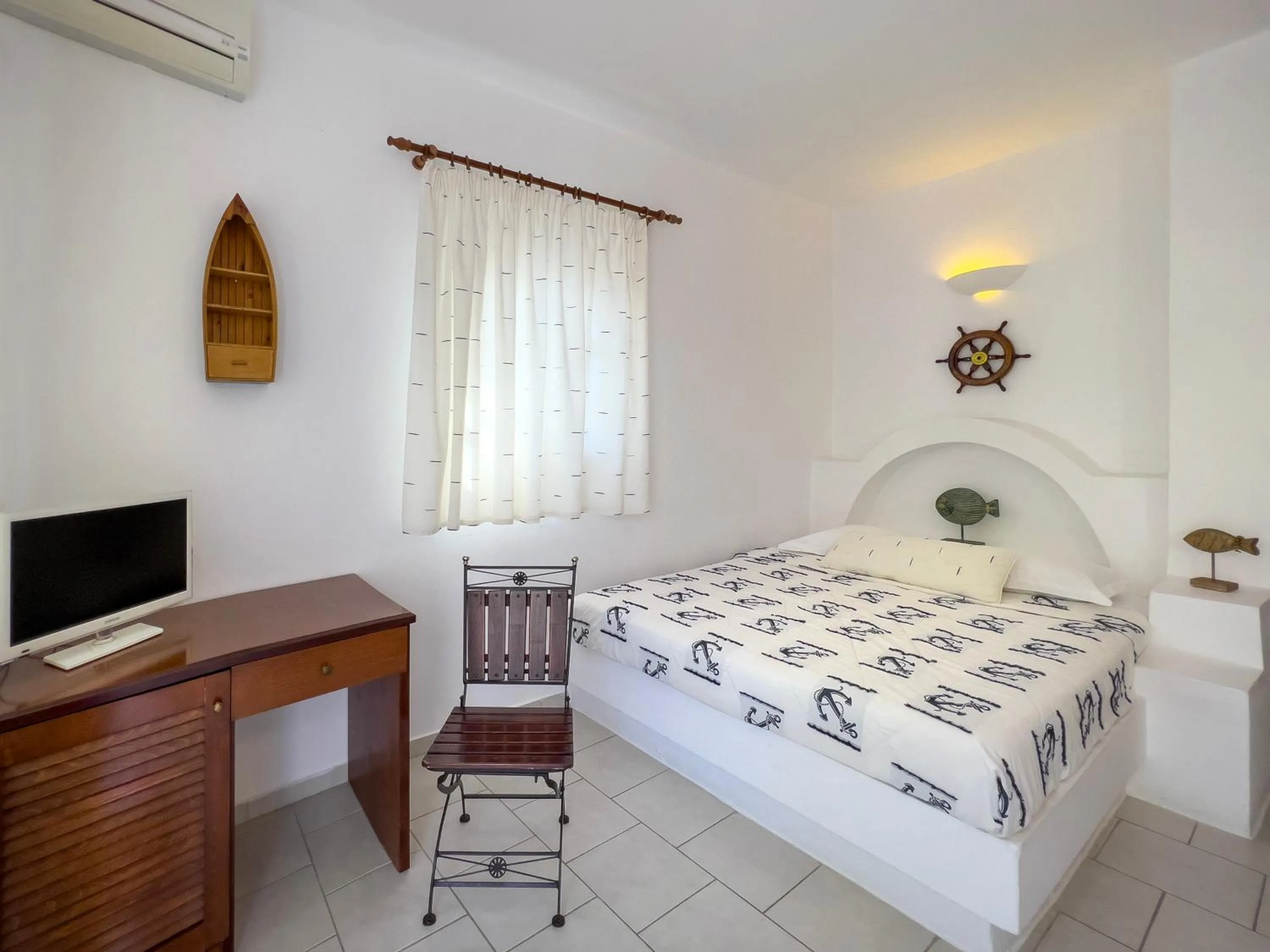 Bed in Chora Resort Hotel & Spa