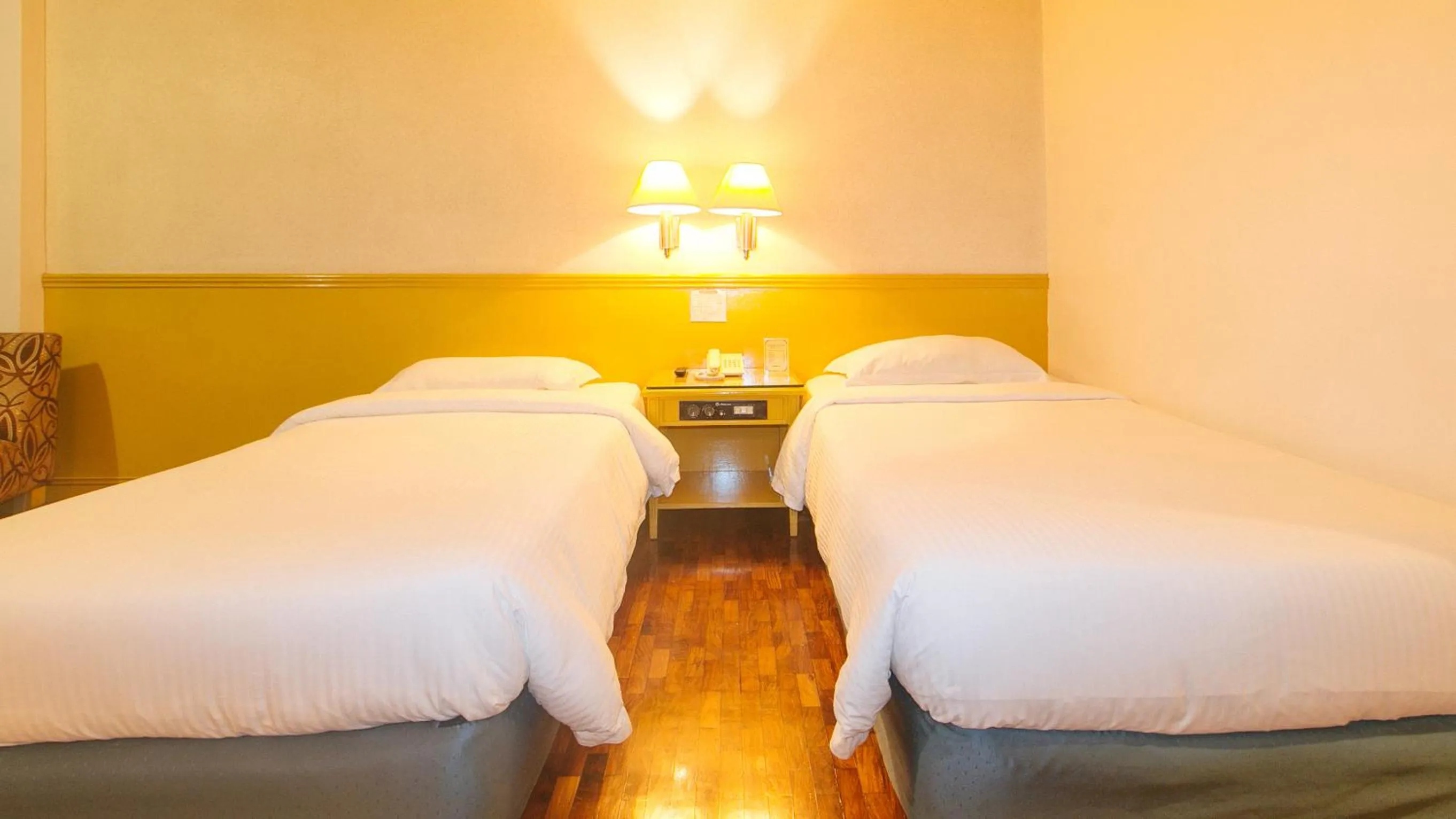 Bed in Aloha Hotel Roxas Boulevard Manila