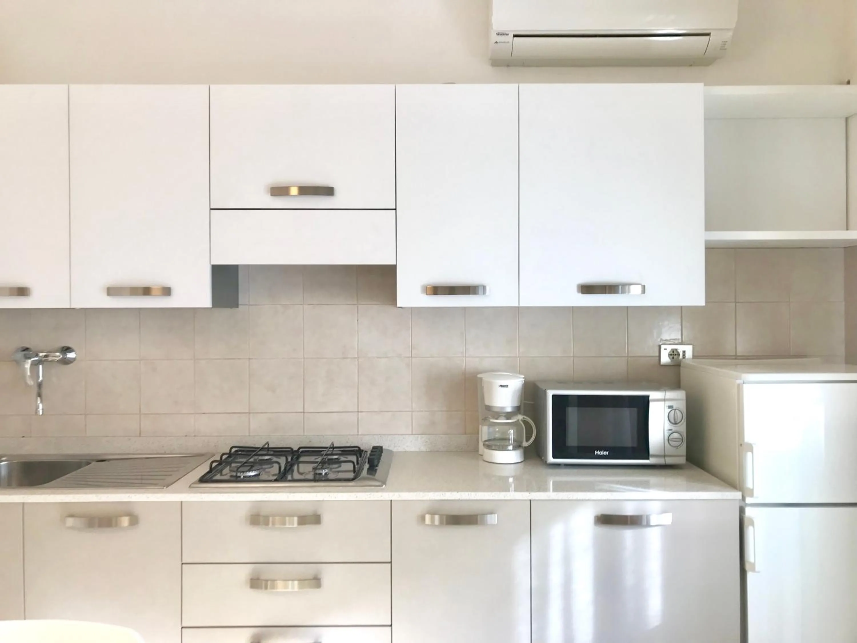 Kitchen or kitchenette in Condominio Elpado