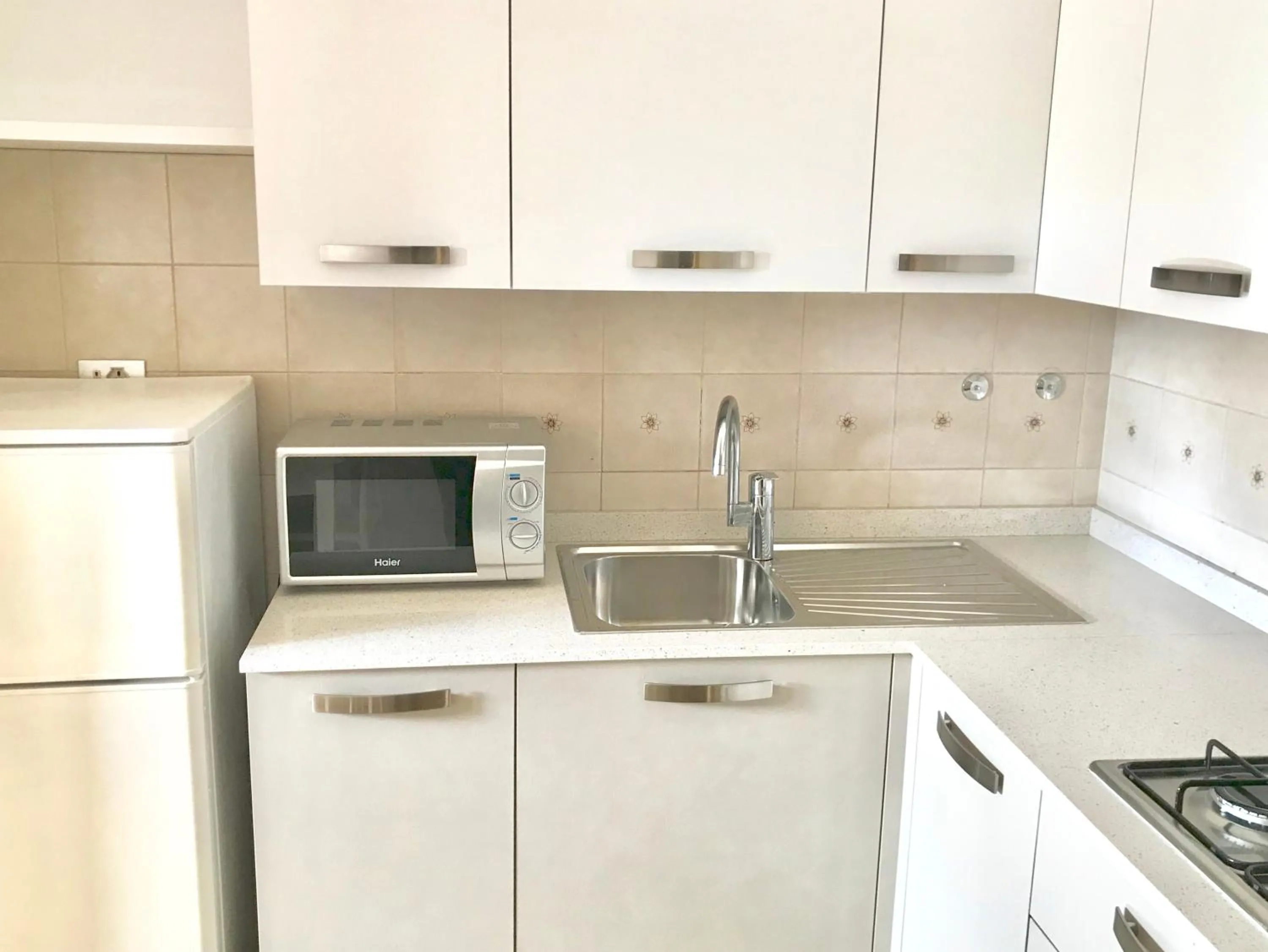 Kitchen or kitchenette in Condominio Elpado