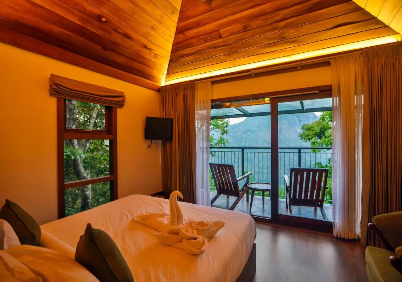 Communal lounge/ TV room, Bed in Chembarathi Wayanad Boutique Resort