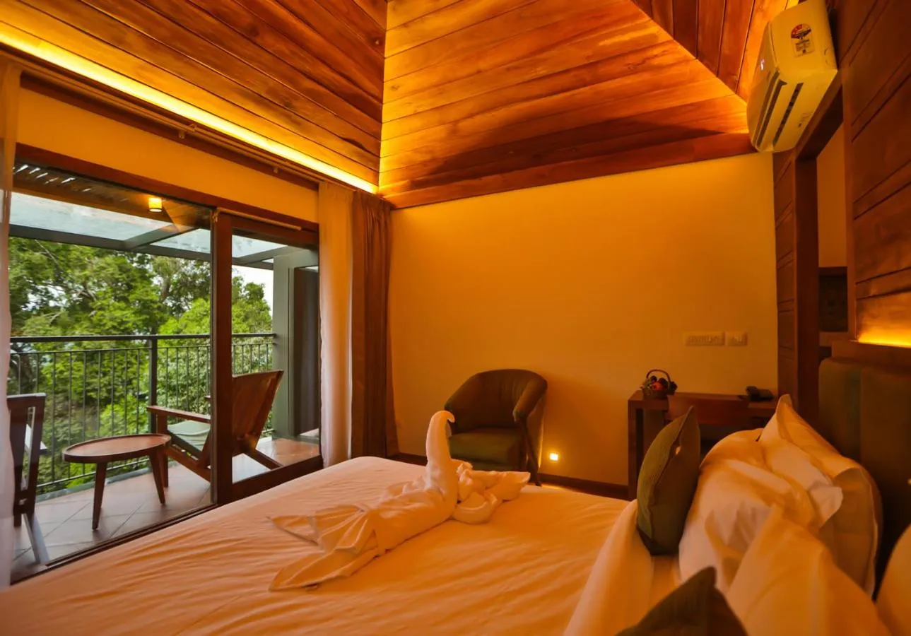 Bed in Chembarathi Wayanad Boutique Resort