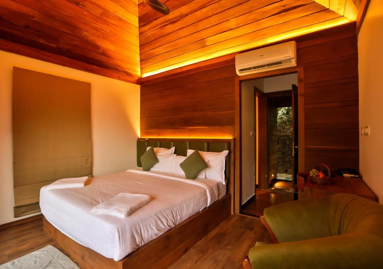 Bed in Chembarathi Wayanad Boutique Resort
