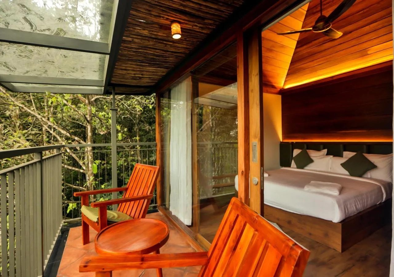Balcony/Terrace, Bed in Chembarathi Wayanad Boutique Resort