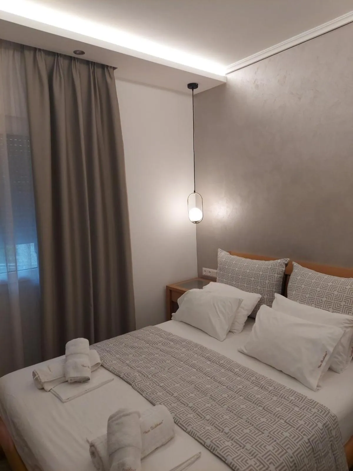 Bed in SUN RESIDENCE Exclusive Seaside Suites