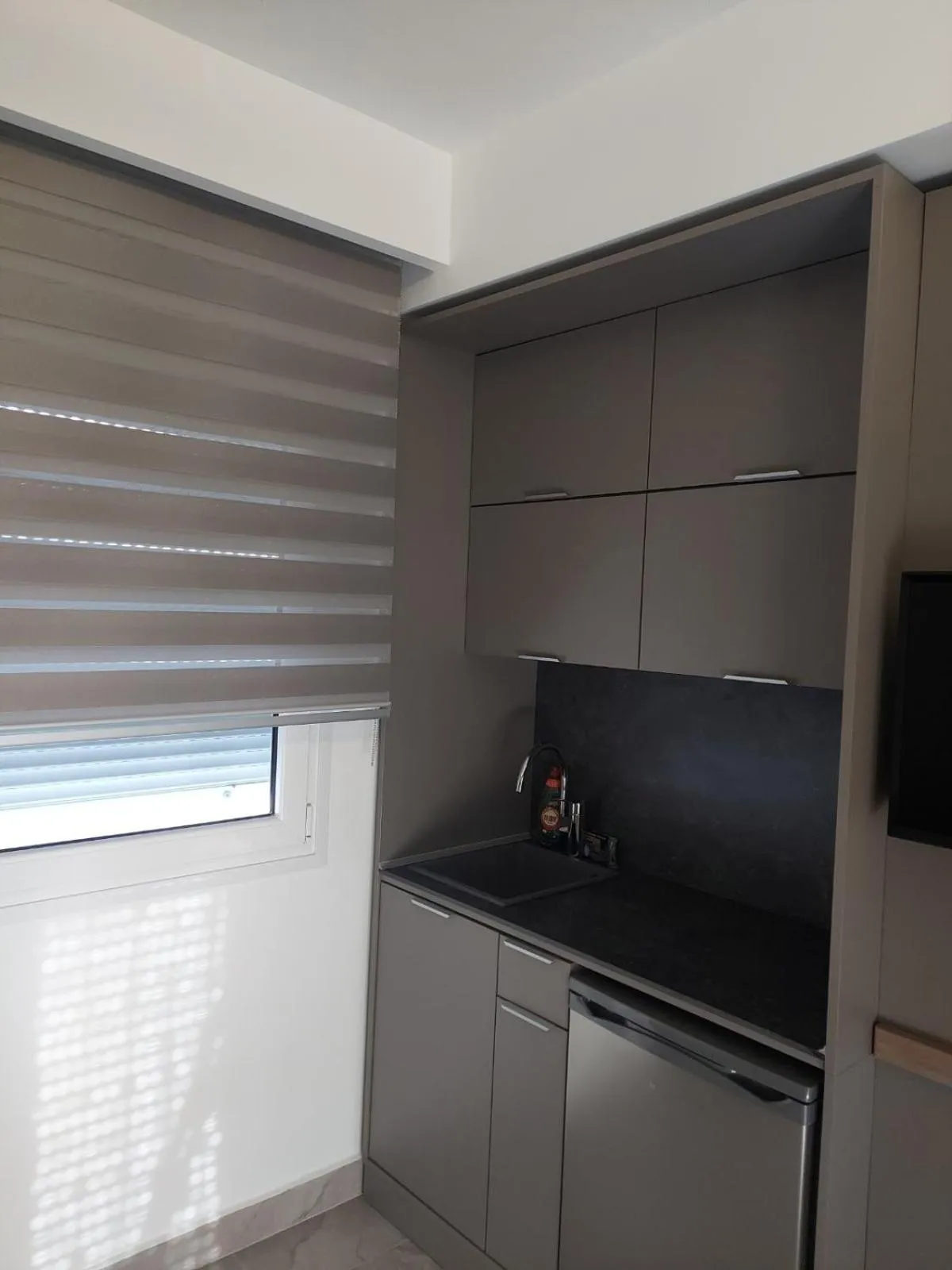 Kitchen or kitchenette in SUN RESIDENCE Exclusive Seaside Suites