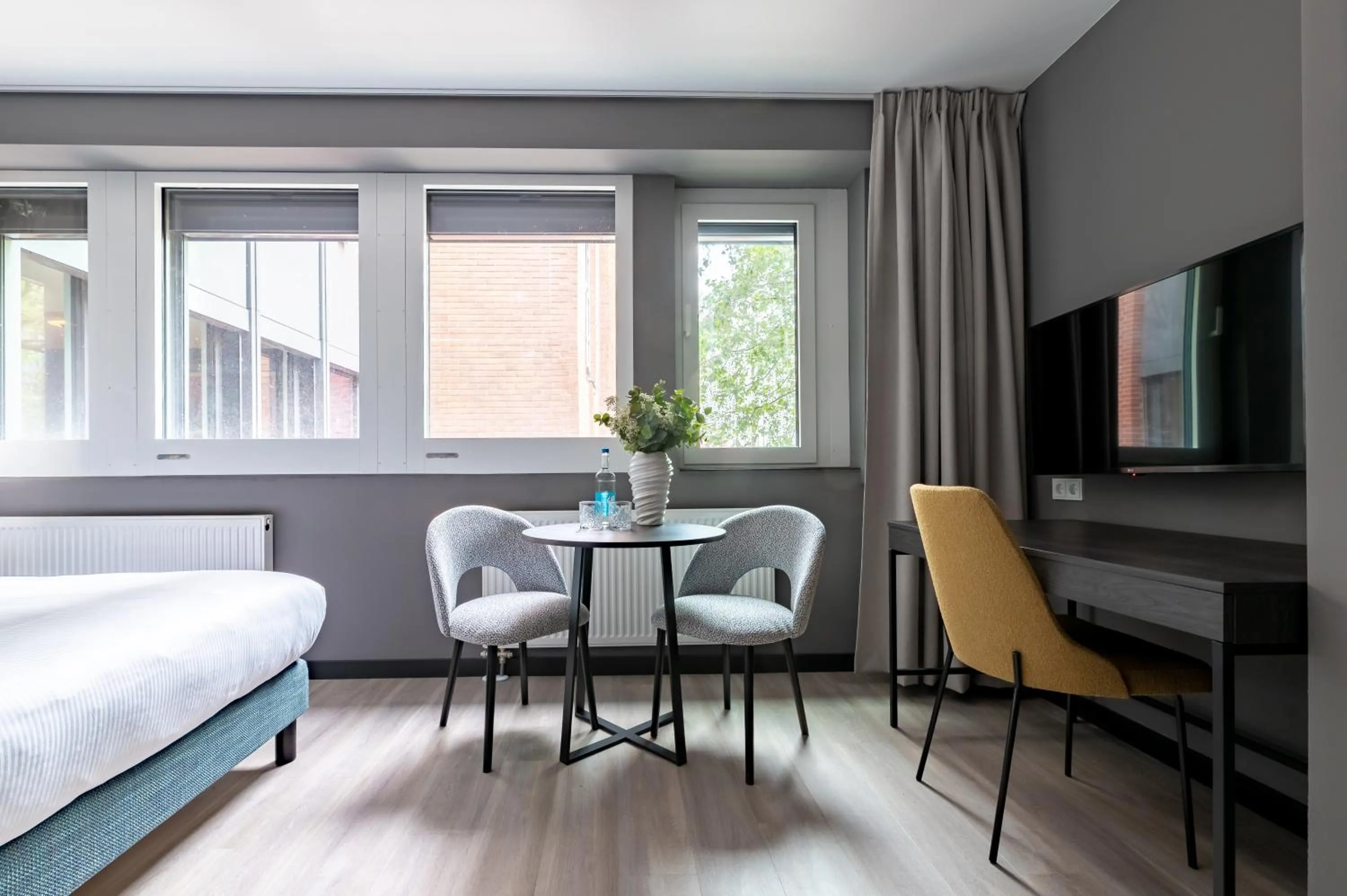 Seating area, Bed in Numa Bremen Saga