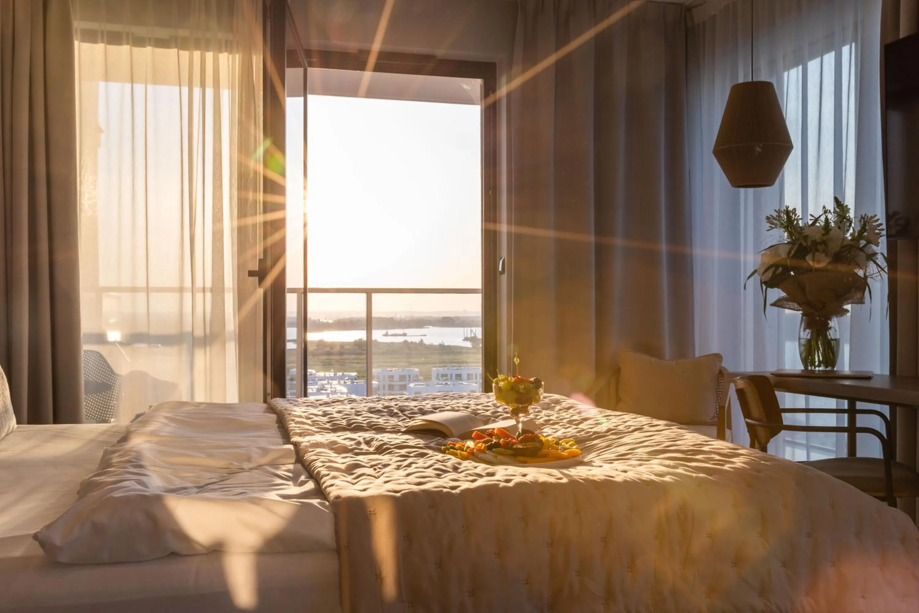 Seating area, Bed in GRANO HOTEL Solmarina