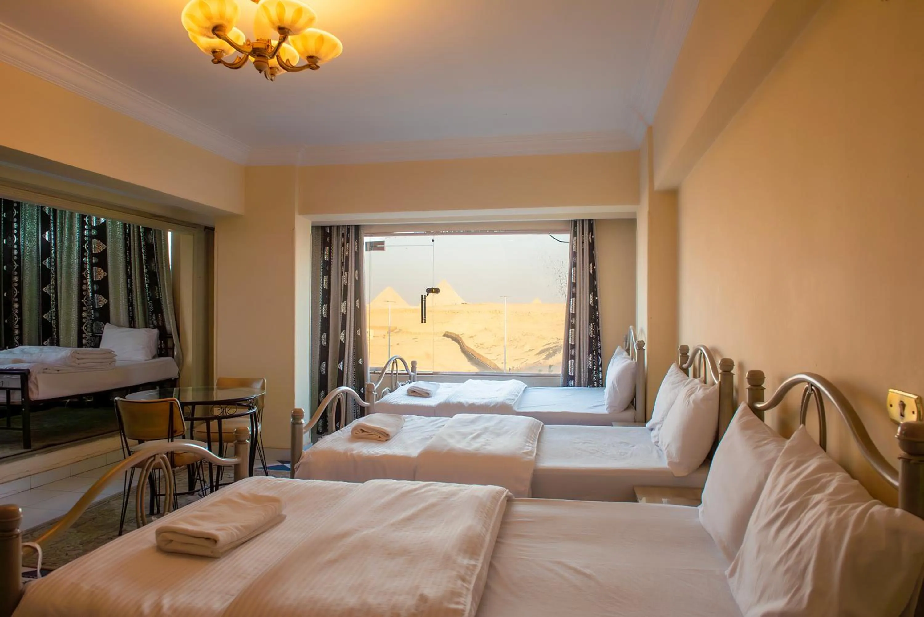 Photo of the whole room, Bed in Pyramita Hotel