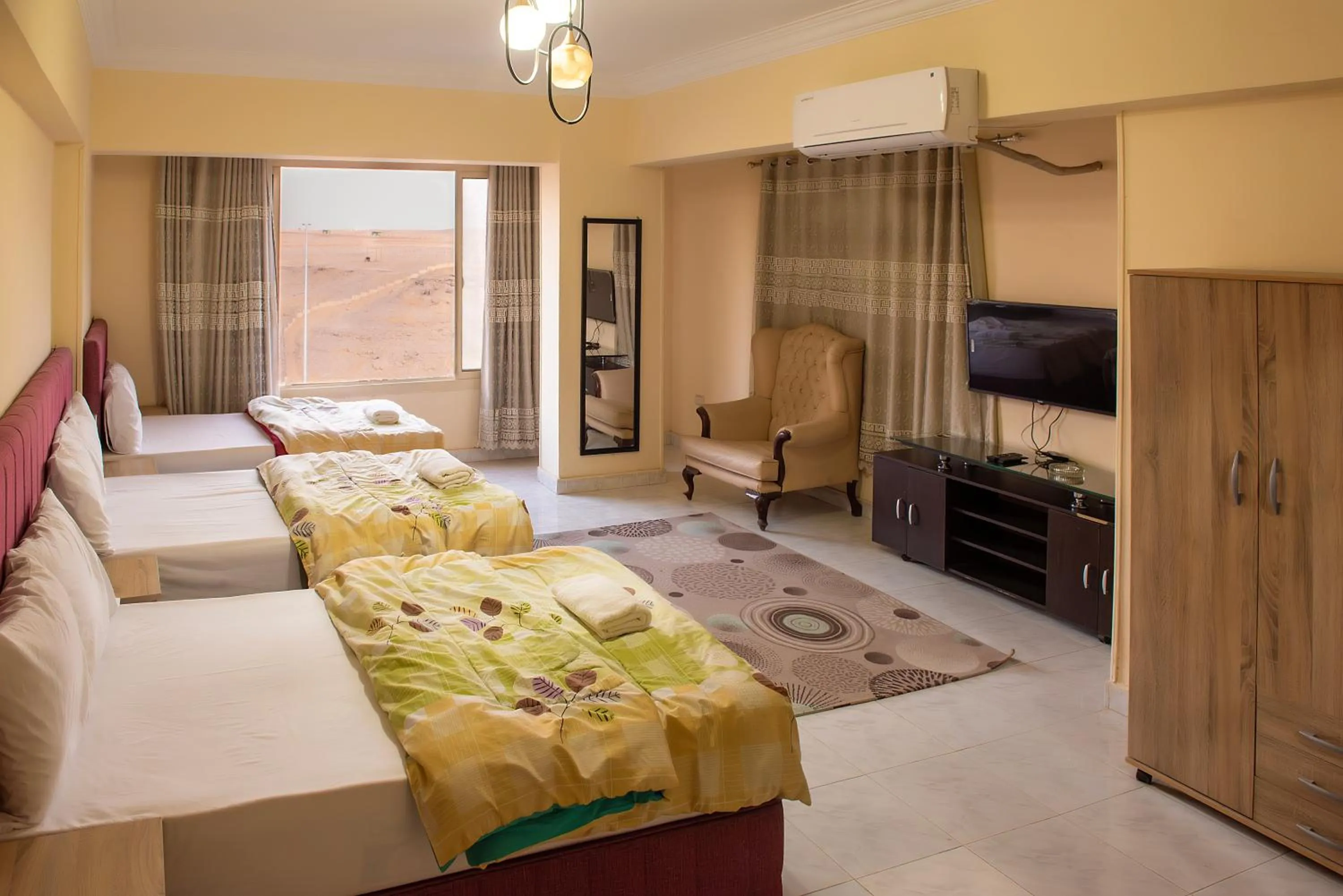 Photo of the whole room, Bed in Pyramita Hotel