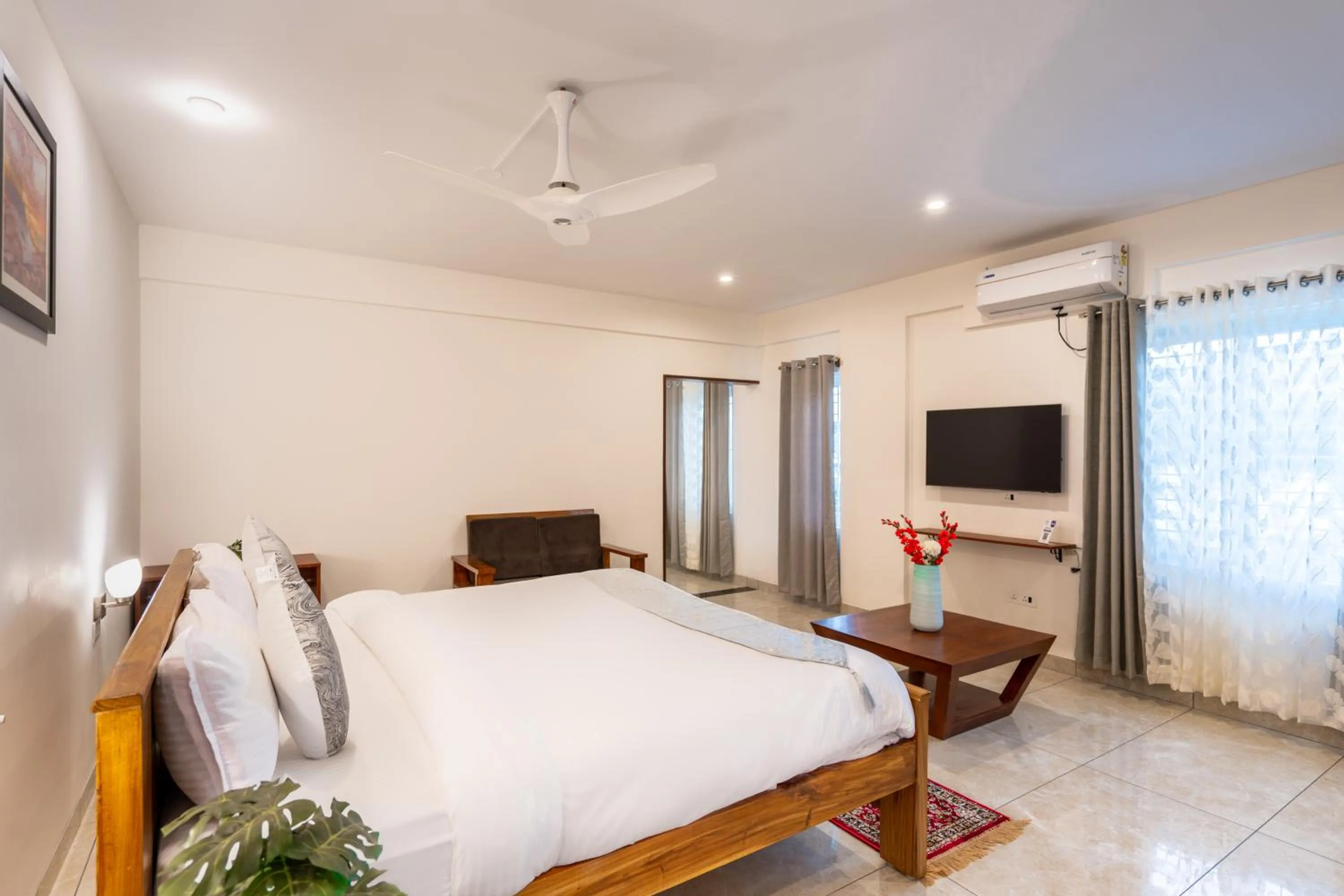 Bed in The Silver Chimes Suites