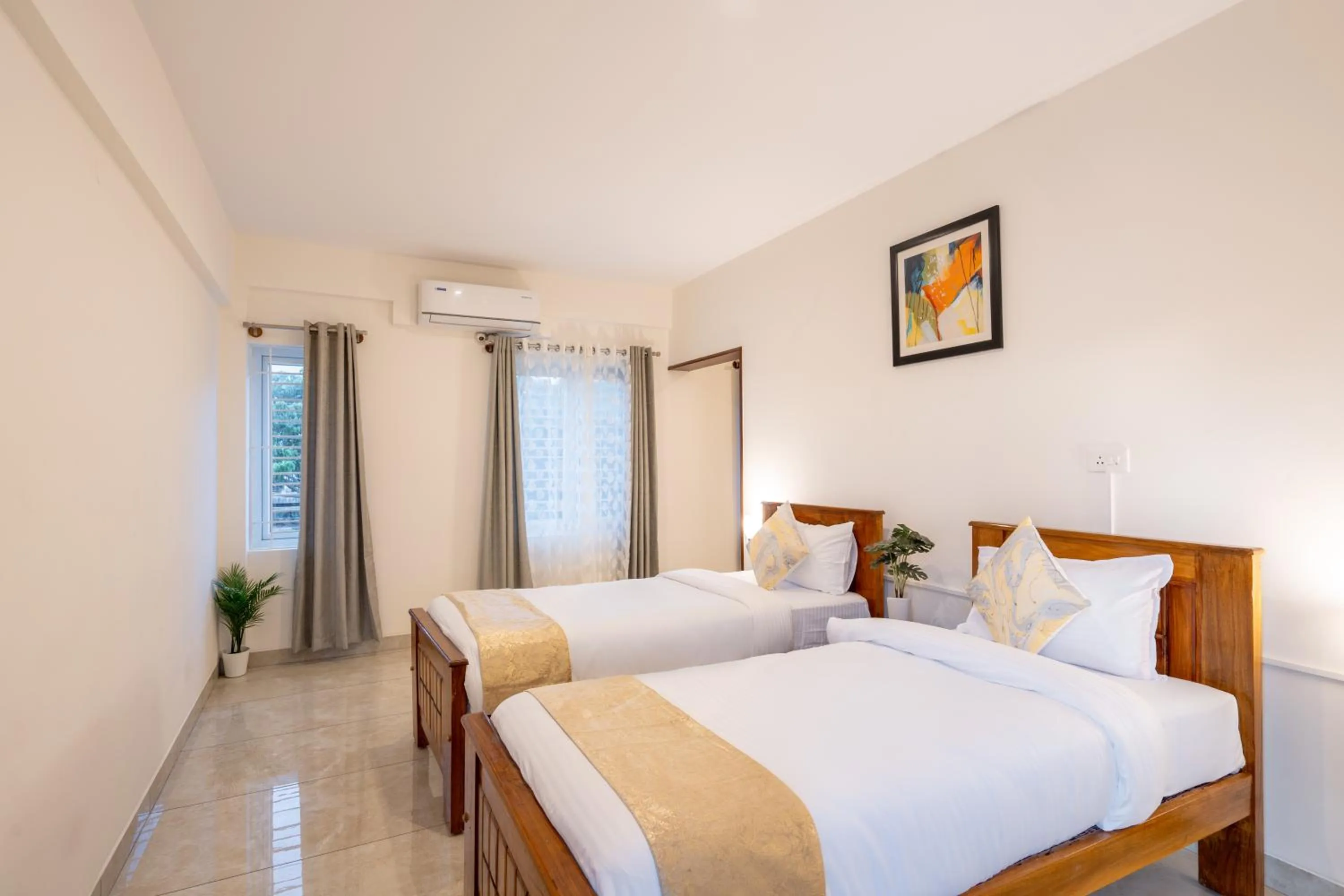 Bed in The Silver Chimes Suites