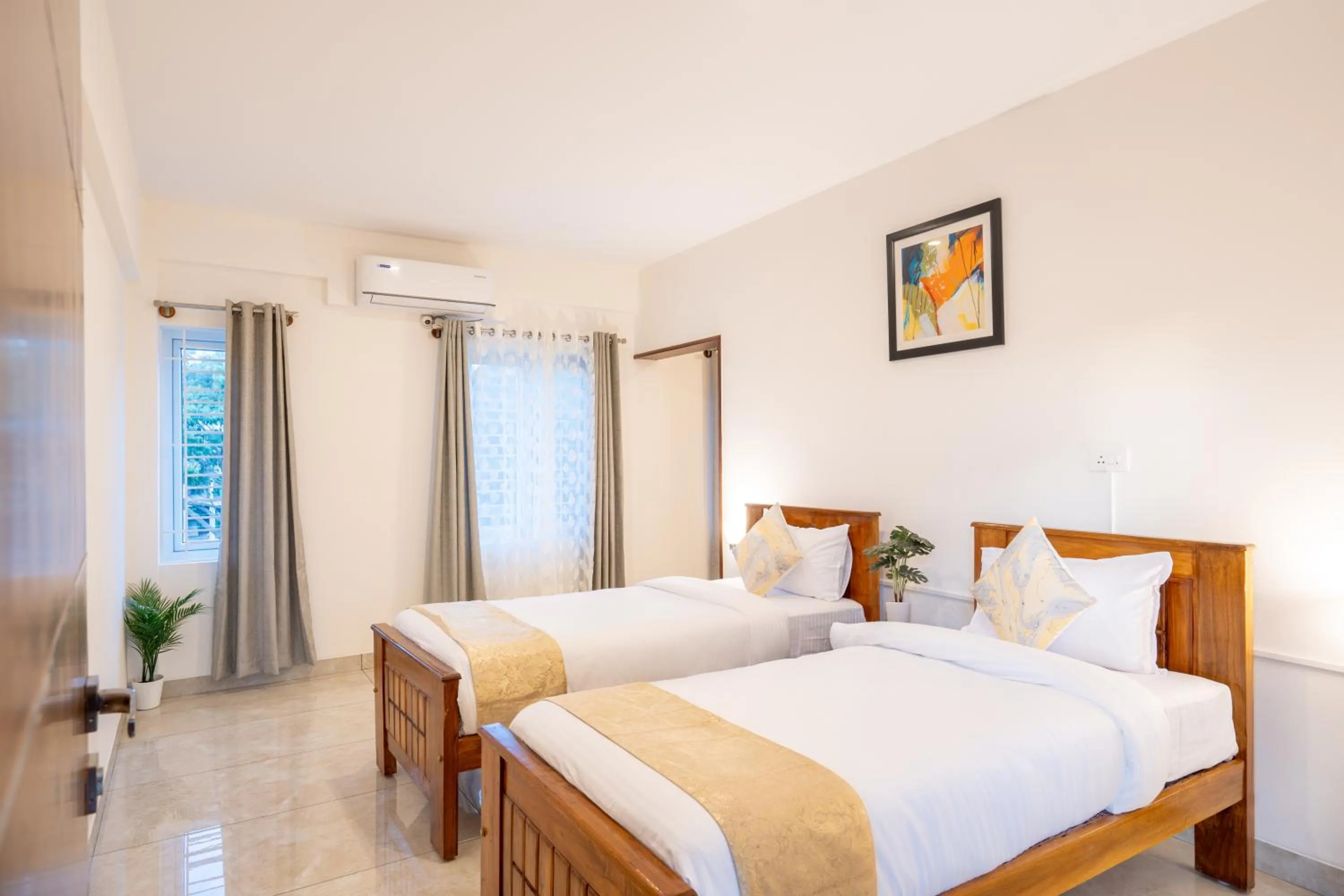 Bed in The Silver Chimes Suites