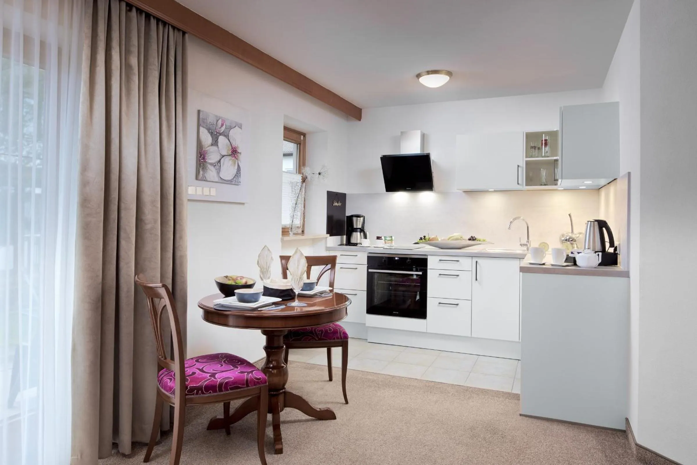 Kitchen or kitchenette in Maximilian Appartements