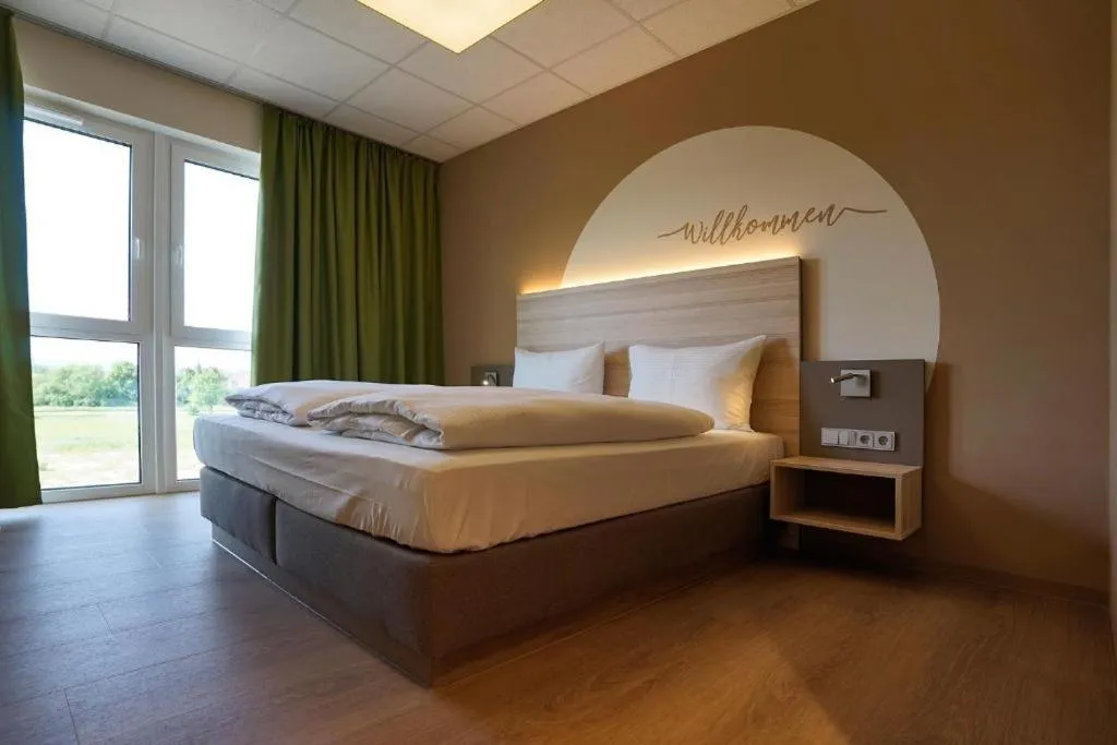 Bed in Mainfranken Motel - Anreise rund um die Uhr - Neueröffnung 2023