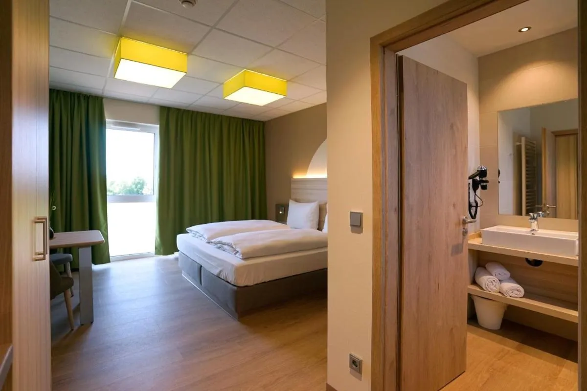 Bed in Mainfranken Motel - Anreise rund um die Uhr - Neueröffnung 2023