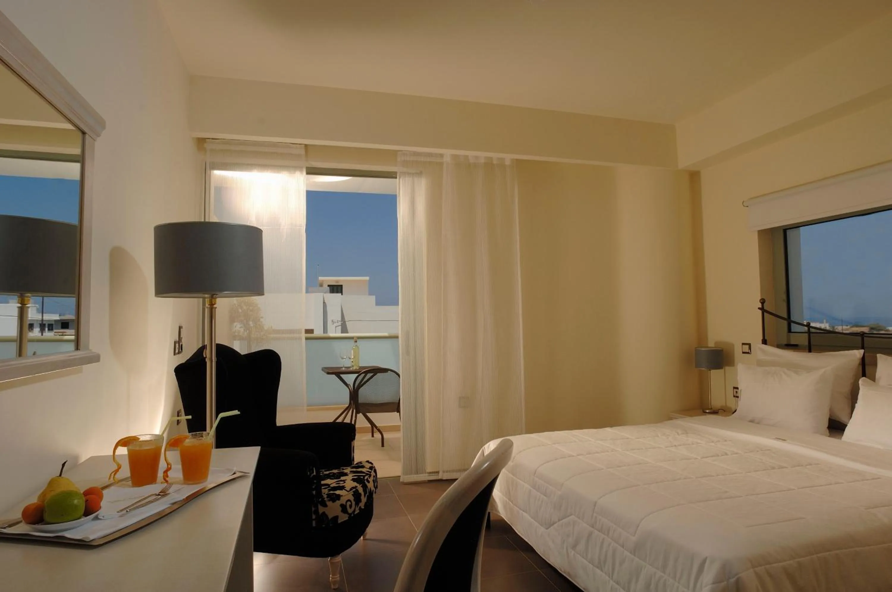 TV and multimedia, Bed in Angela Suites Boutique Hotel