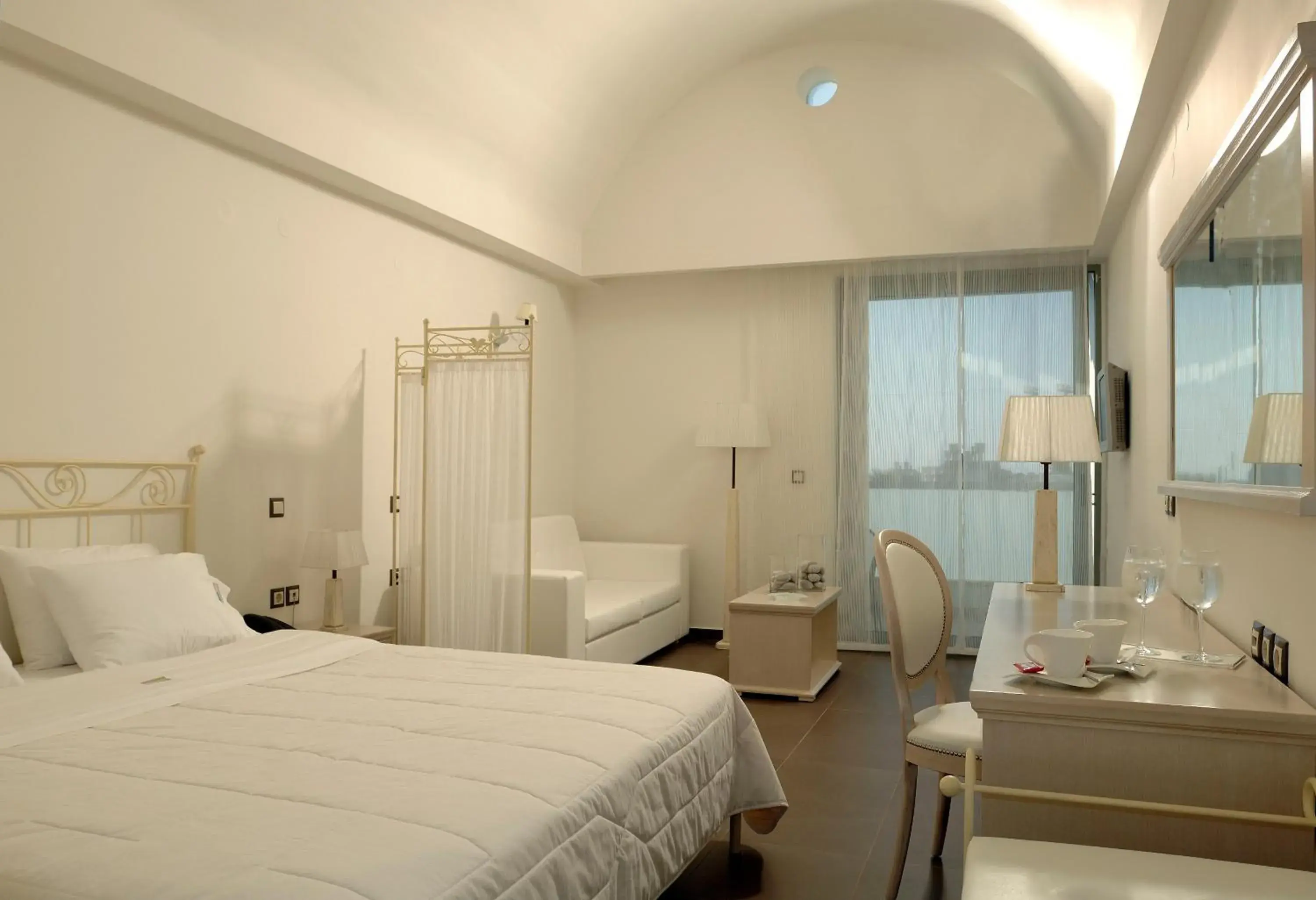 Photo of the whole room, Bed in Angela Suites Boutique Hotel Photo of the whole room, Bed in Angela Suites Boutique Hotel