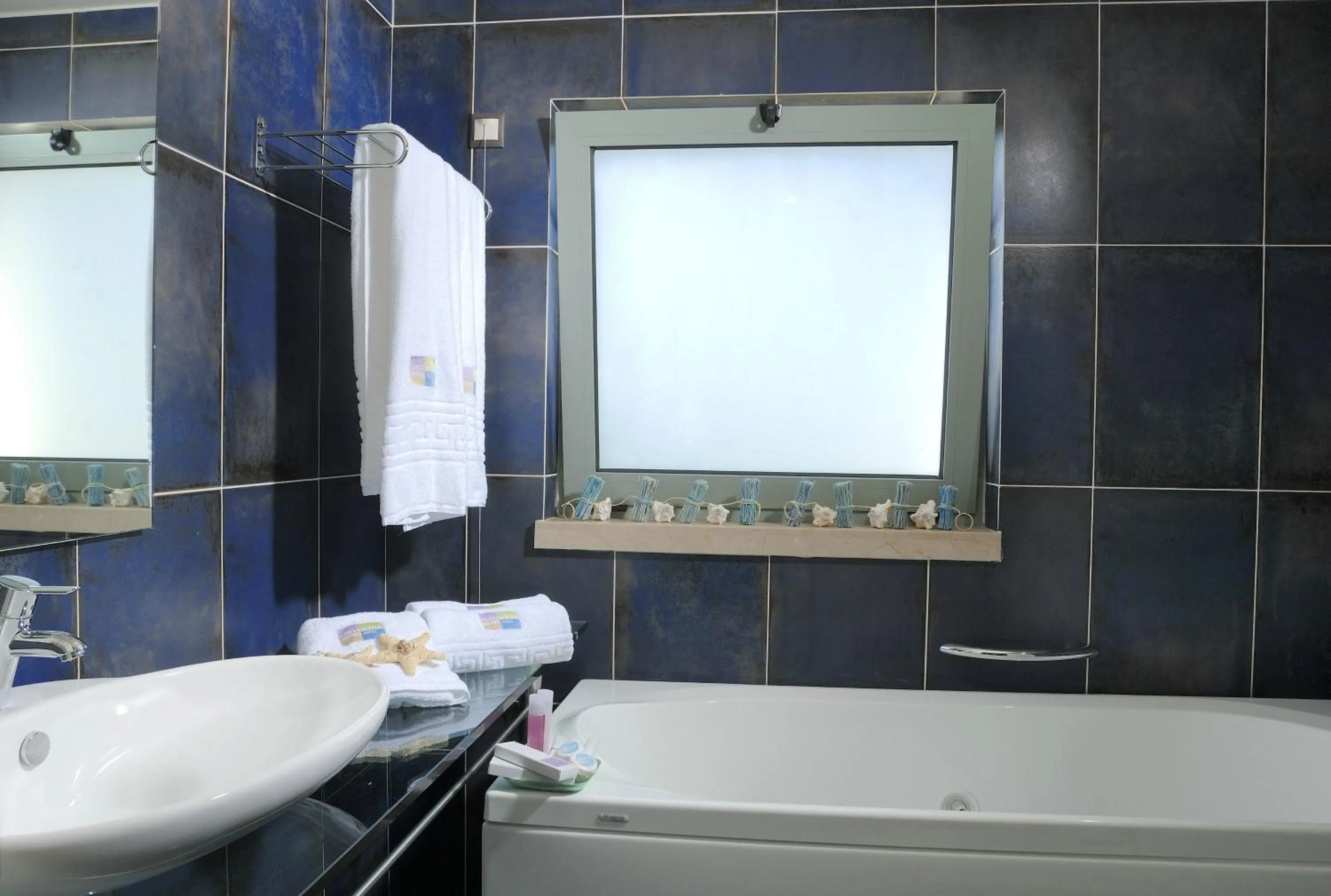 Toilet in Angela Suites Boutique Hotel