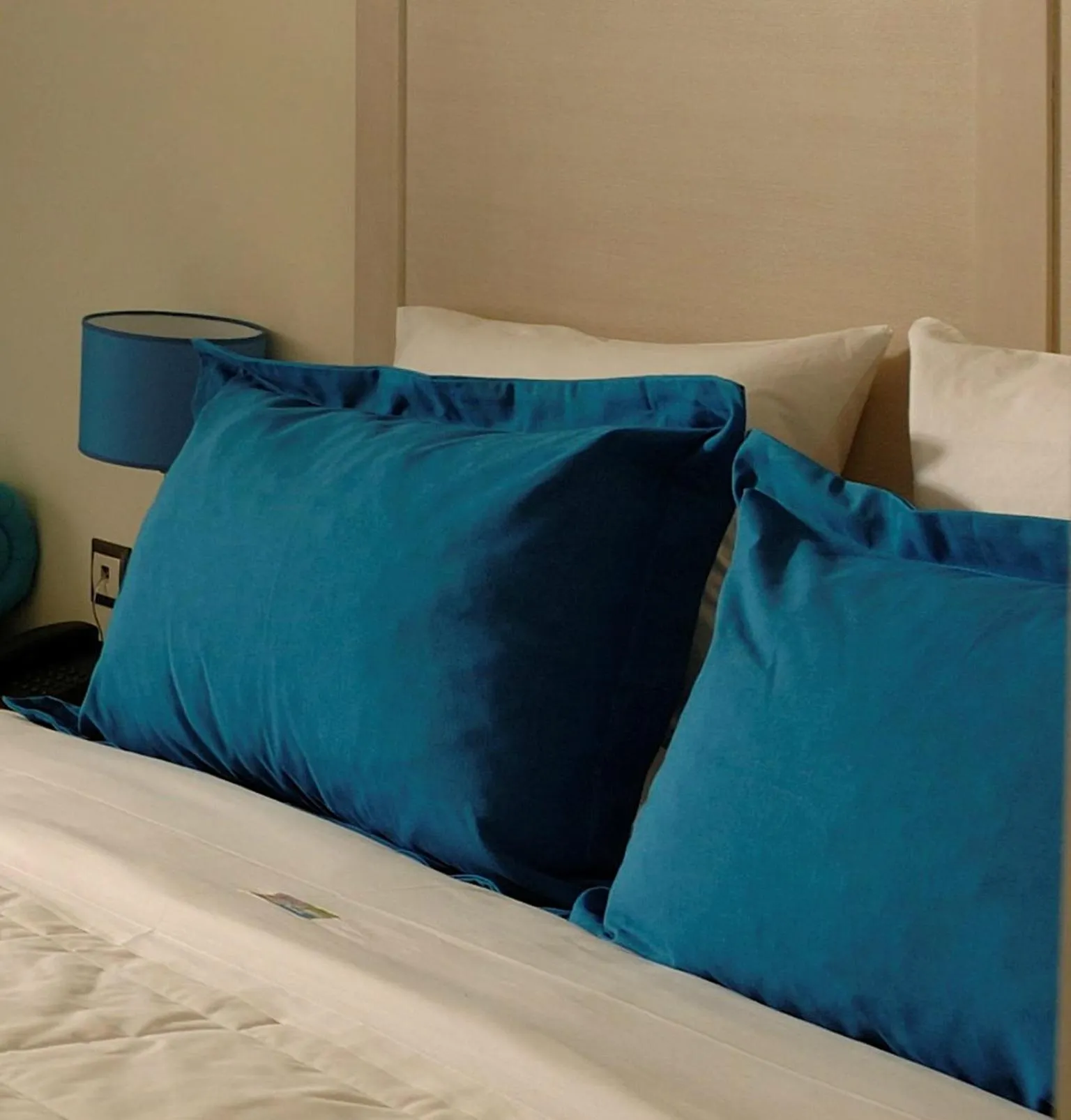 Bed in Angela Suites Boutique Hotel