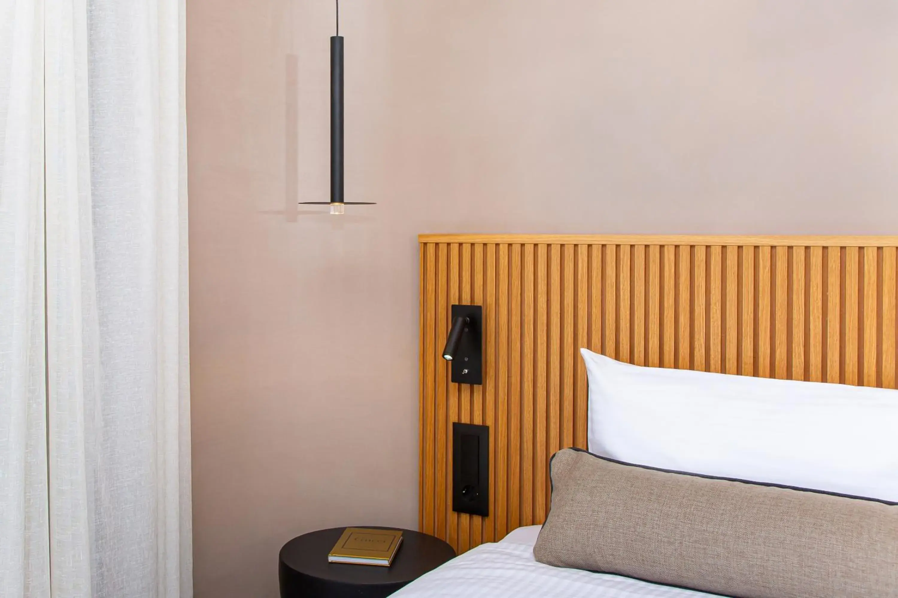 Bed in Aeolos Beach Resort Bed in Aeolos Beach Resort