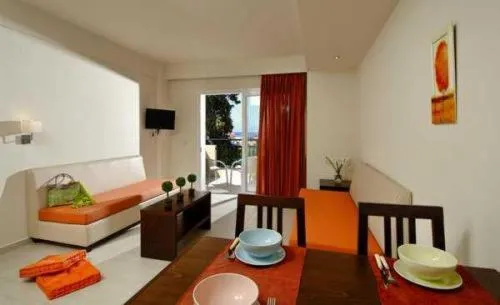 Living room, Bed in Rainbow Apartments