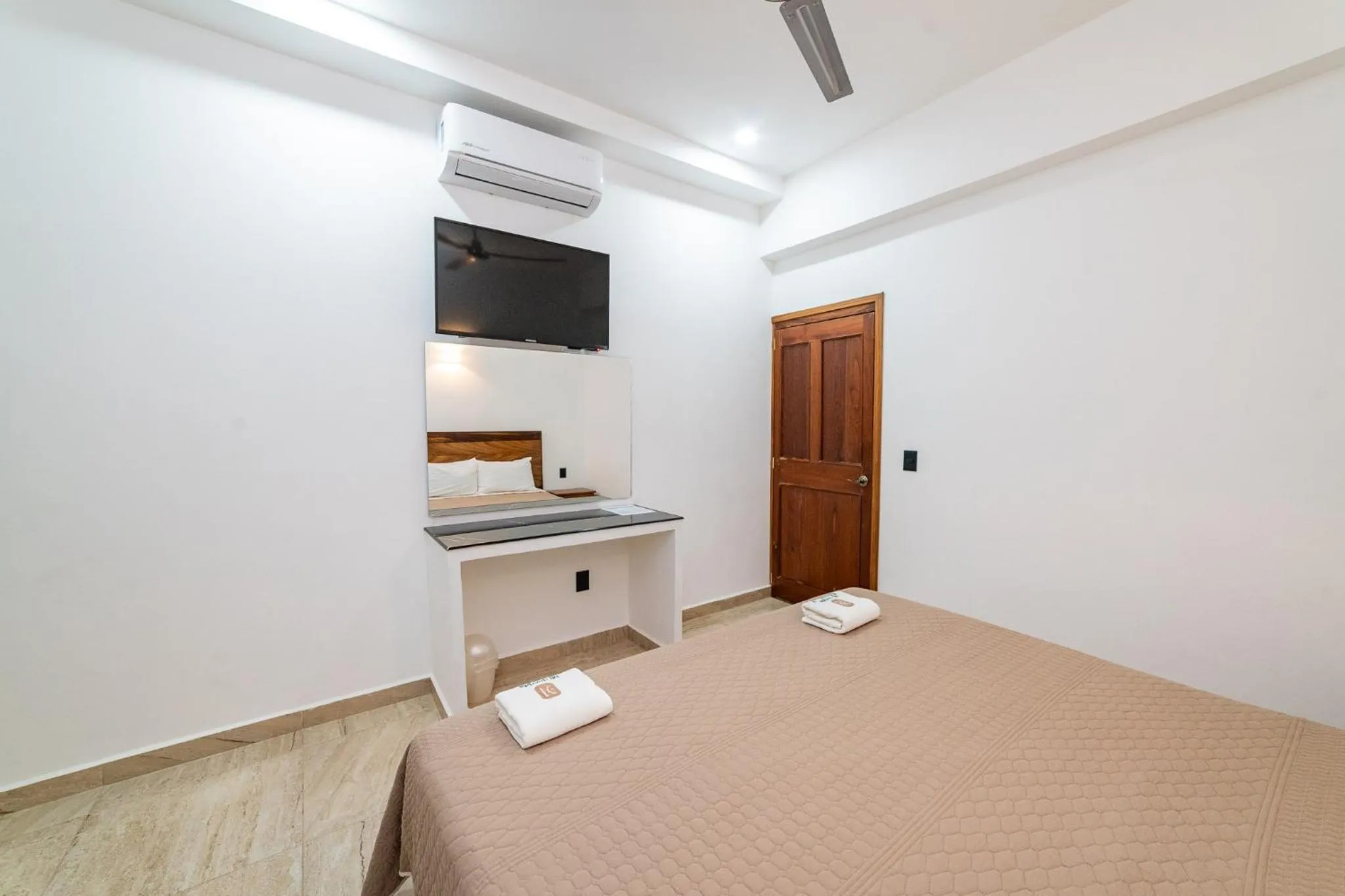 Bed in Mi Querida Maribel Hotel