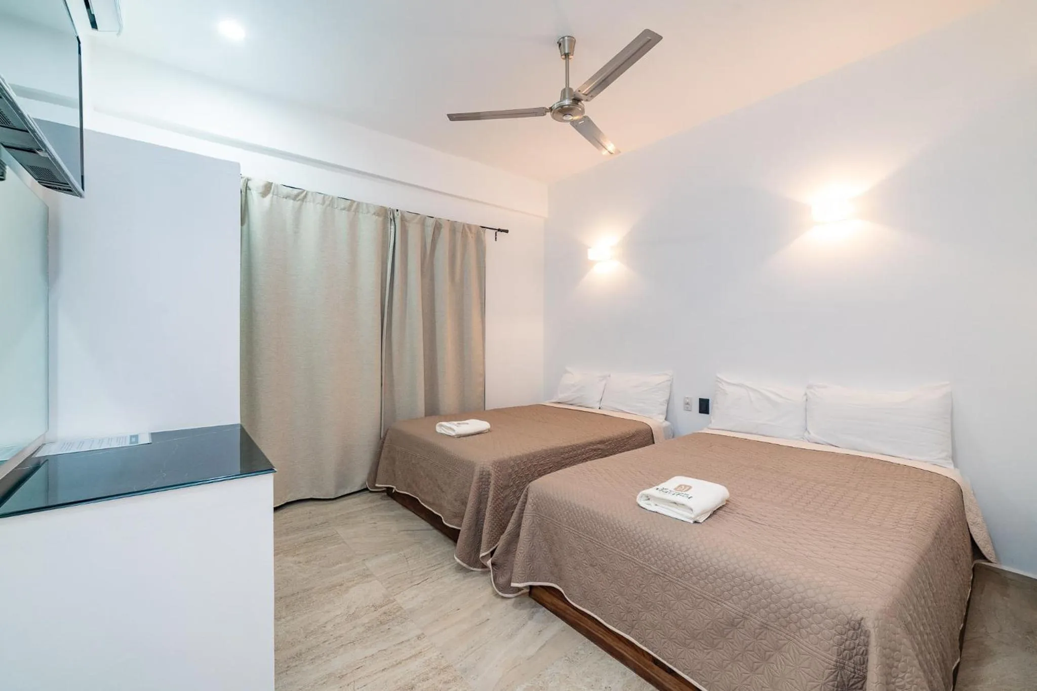 Bed in Mi Querida Maribel Hotel