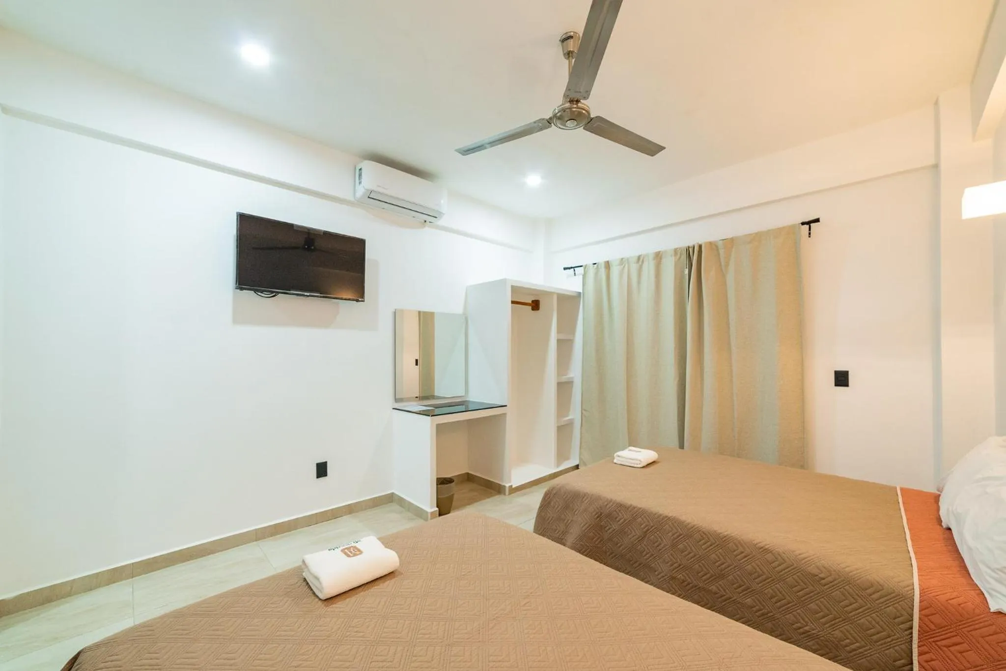 Bed in Mi Querida Maribel Hotel