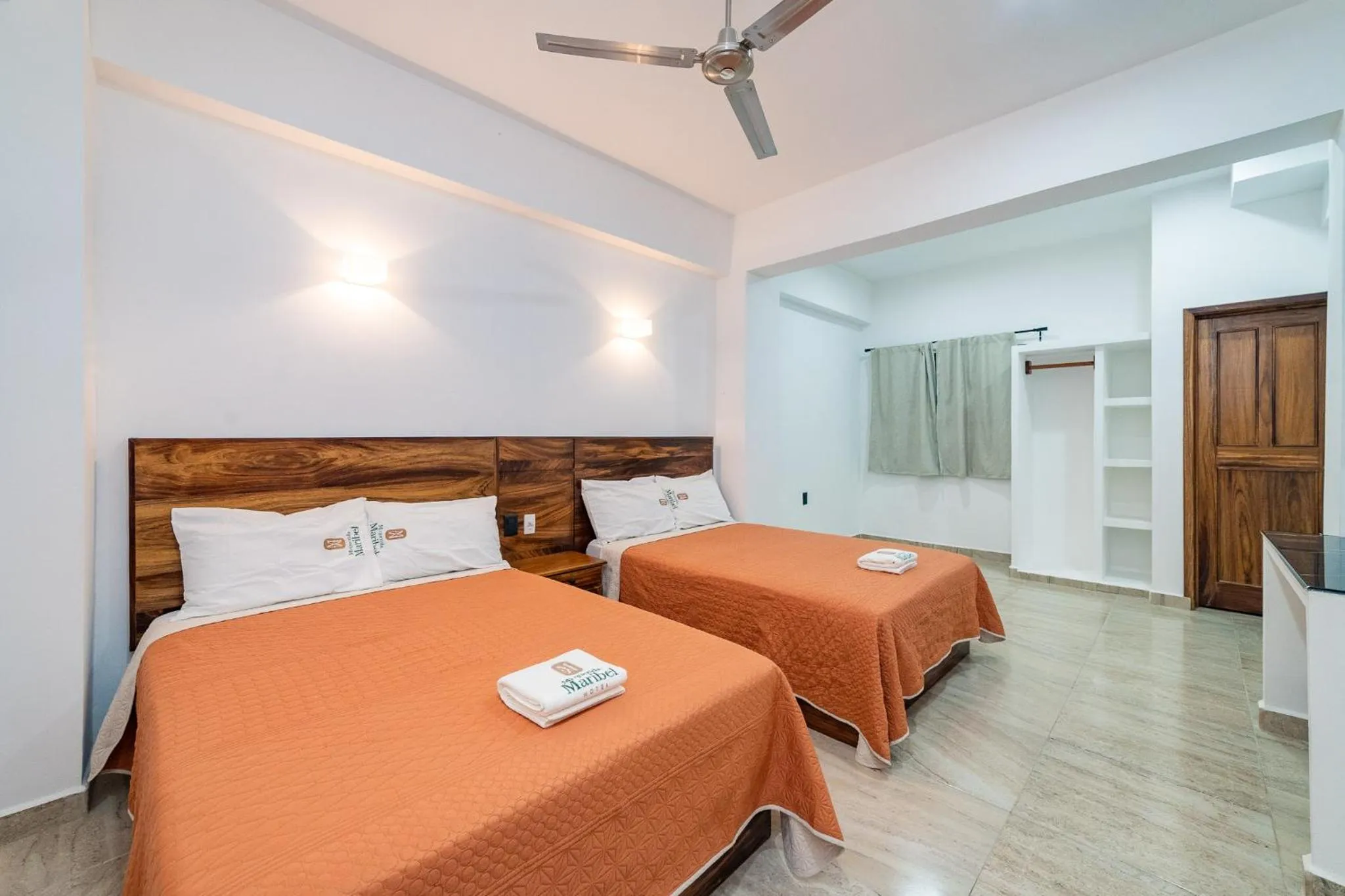 Bed in Mi Querida Maribel Hotel