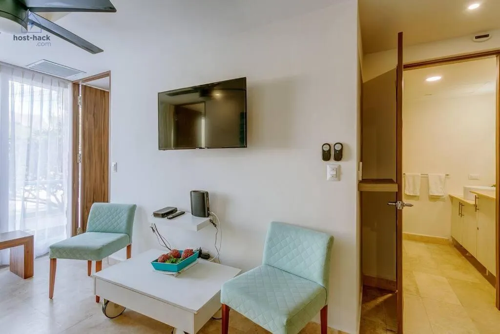 Living room in Dpto a 5 min de la Playa con Piscina y Rooftop