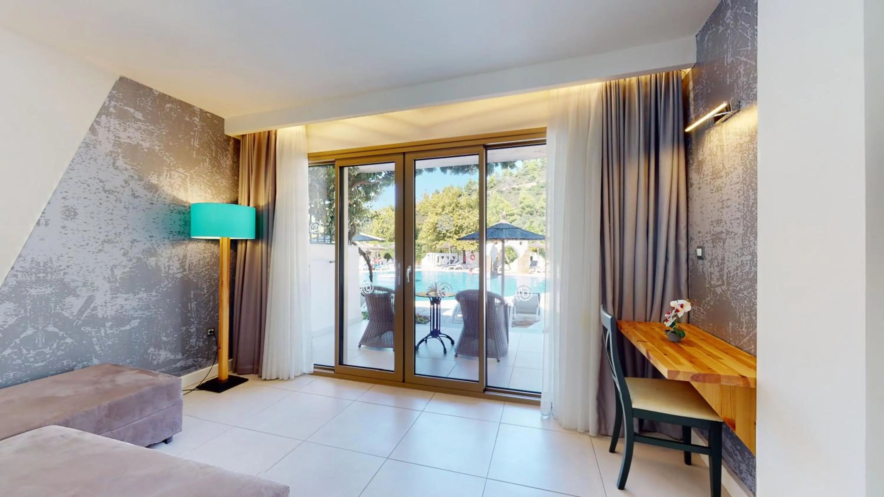 Living room, Bed in Acrotel Athena Pallas & Residence