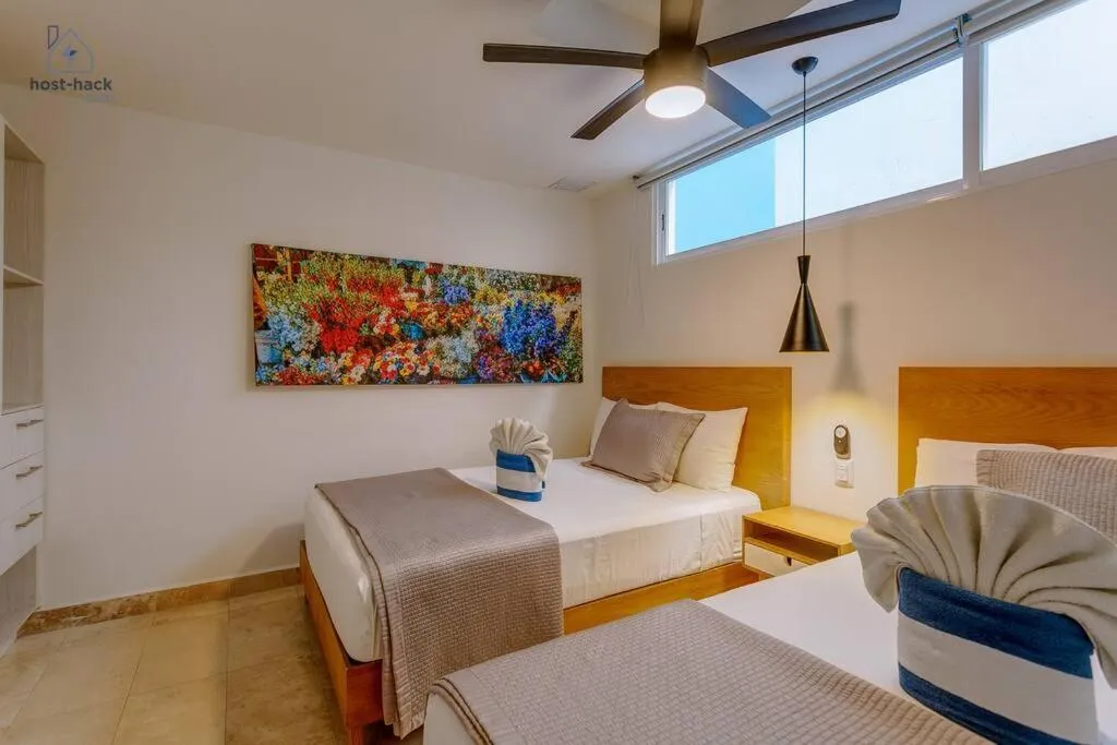 Photo of the whole room, Bed in Danzamar 4, 5 blocks away from Playa Pelicanos