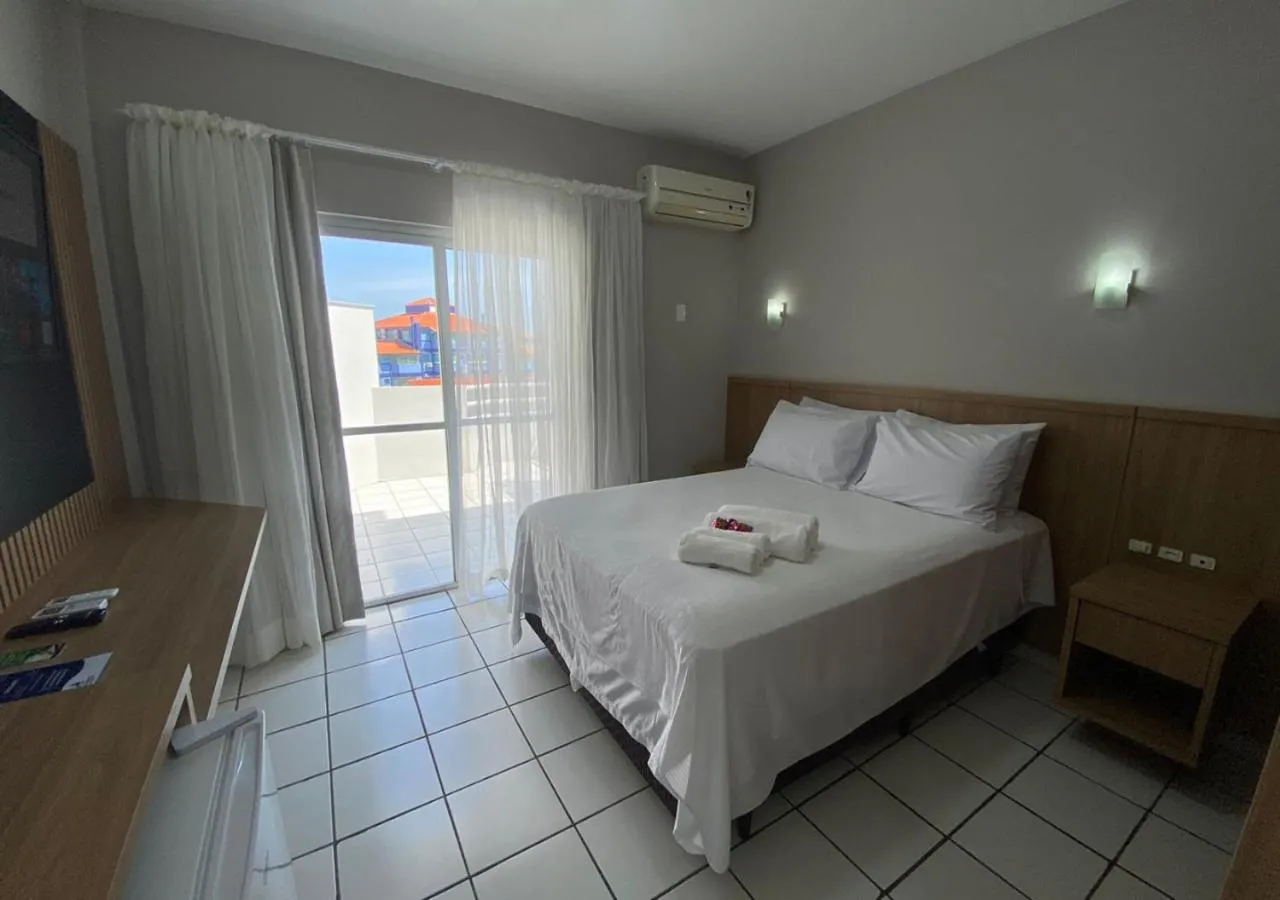 Photo of the whole room, Bed in Ilha Forte Praia Hotel