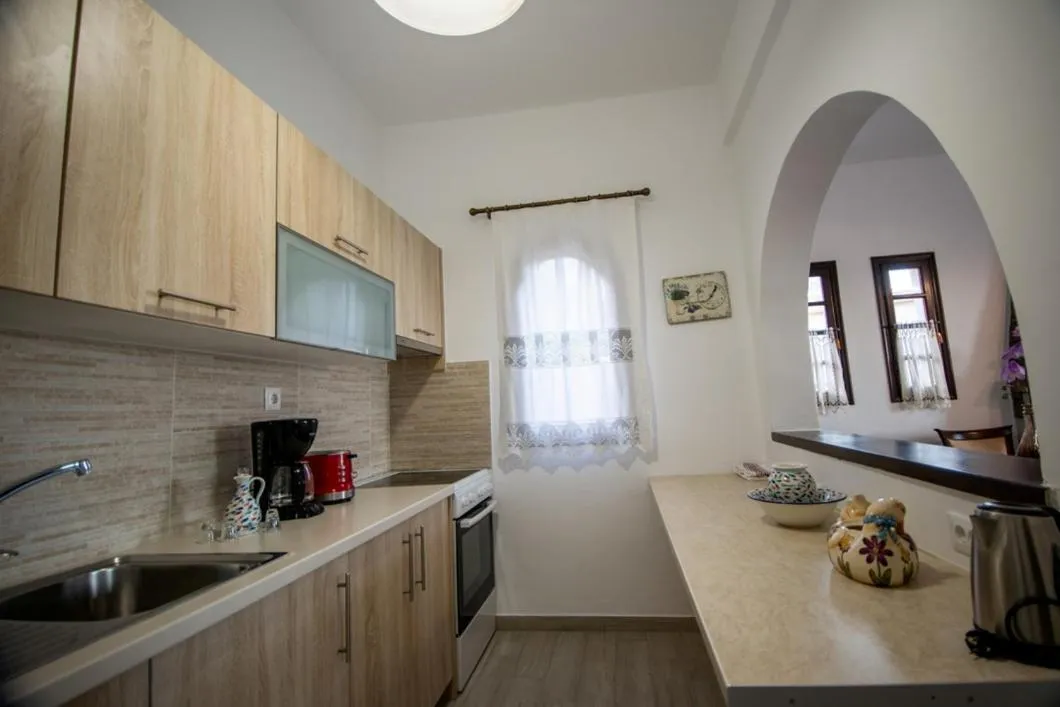 Kitchen or kitchenette in Vangelis Villas