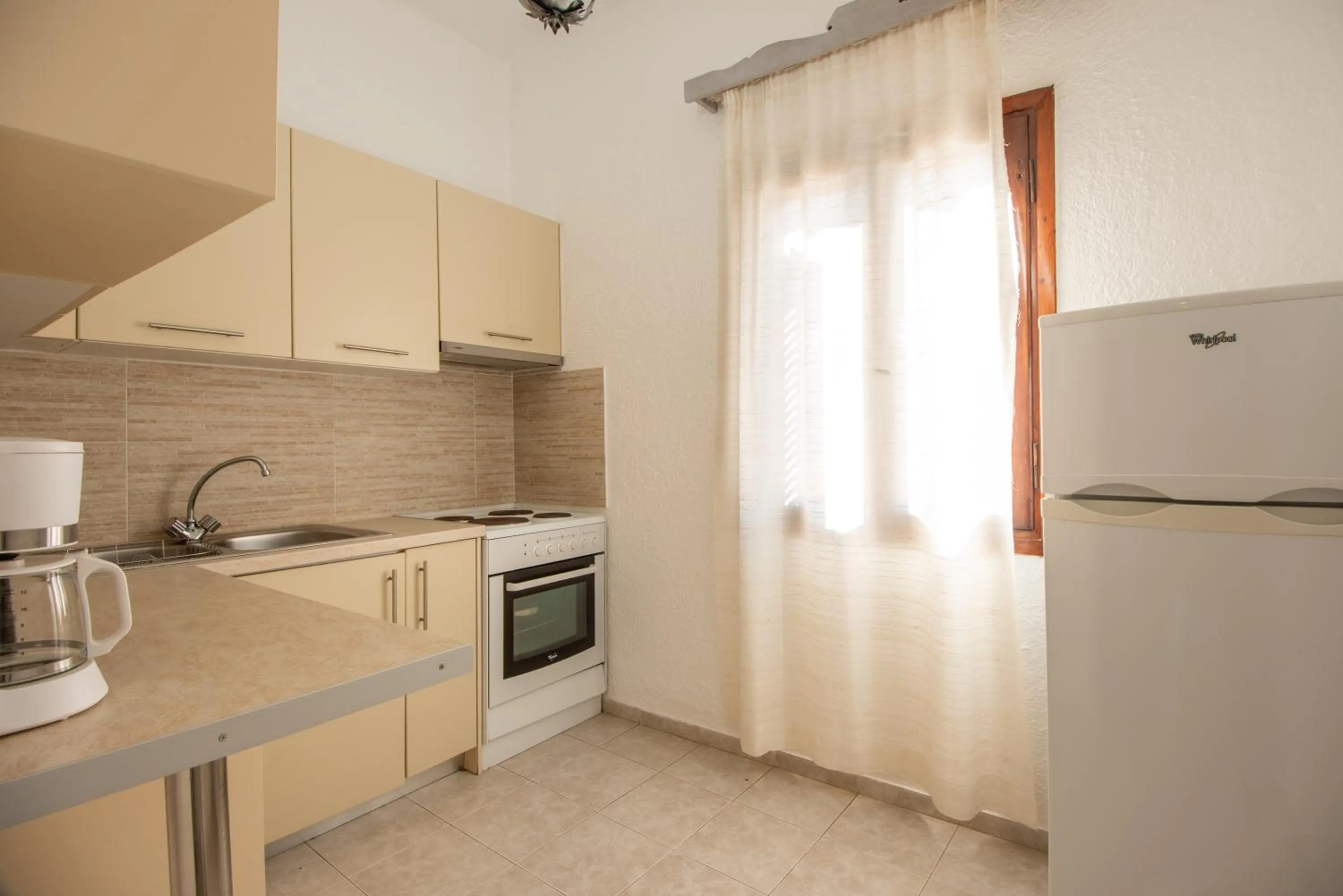 Kitchen or kitchenette in Vangelis Villas