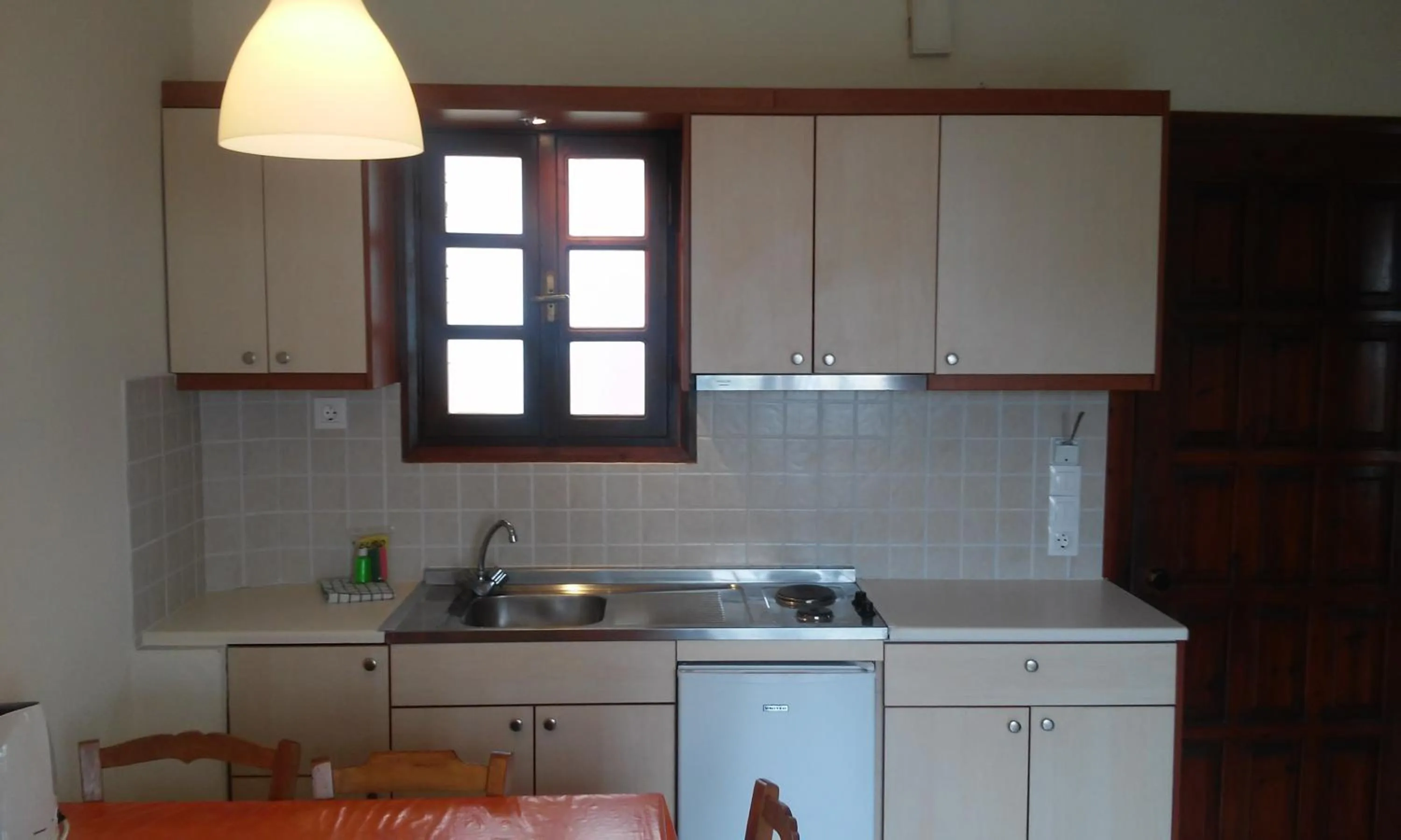 Kitchen or kitchenette in Alexandros Studios