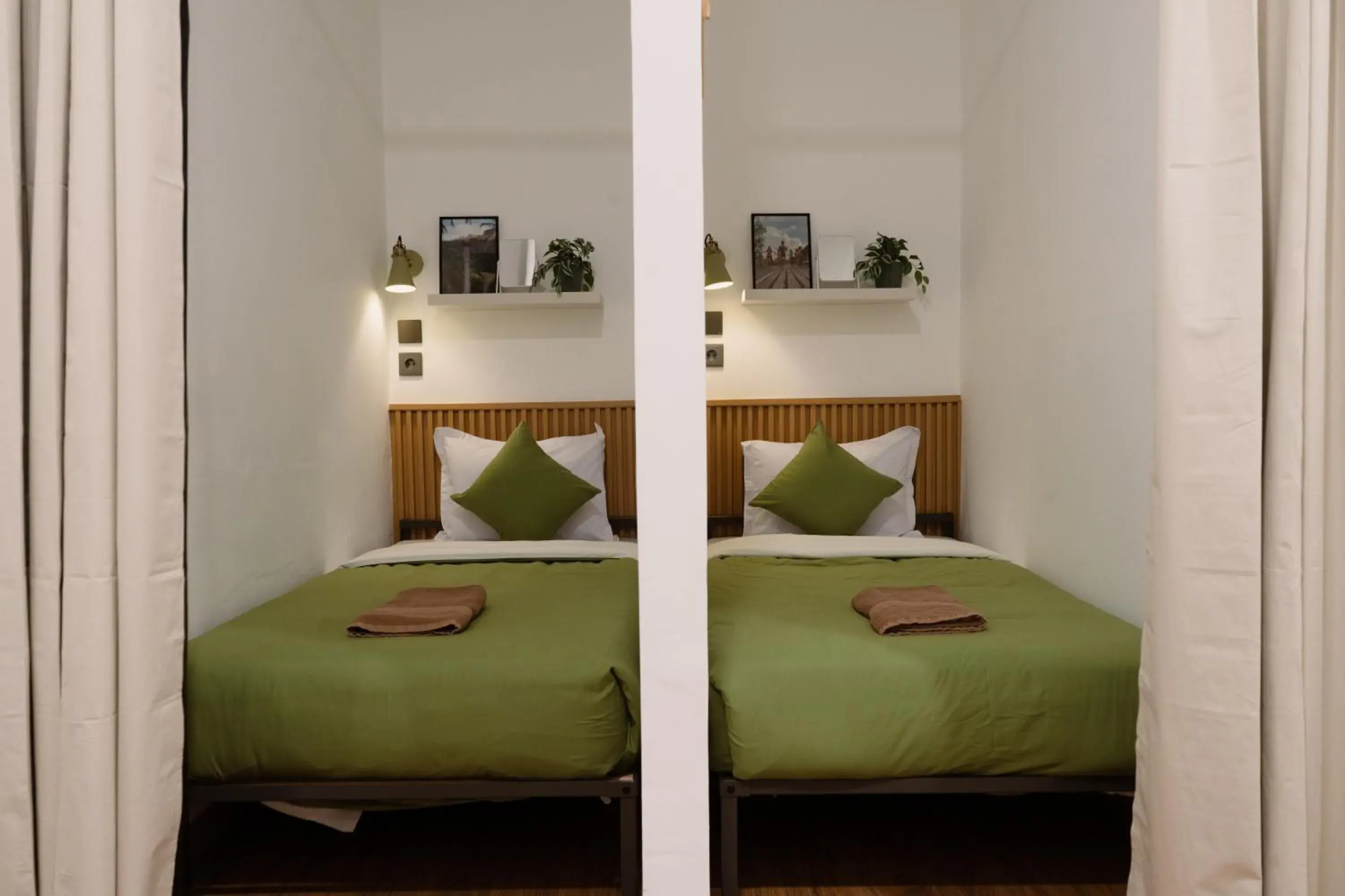 Single Bed in Female Dormitory Room in Snooze Malang Single Bed in Female Dormitory Room in Snooze Malang