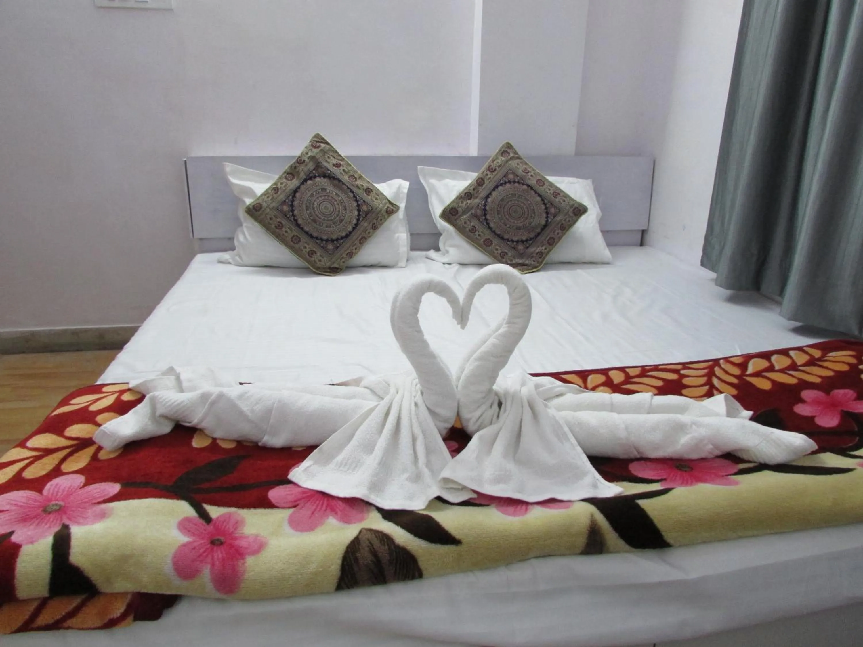 Bed in Ashish Guest House, Udaipole