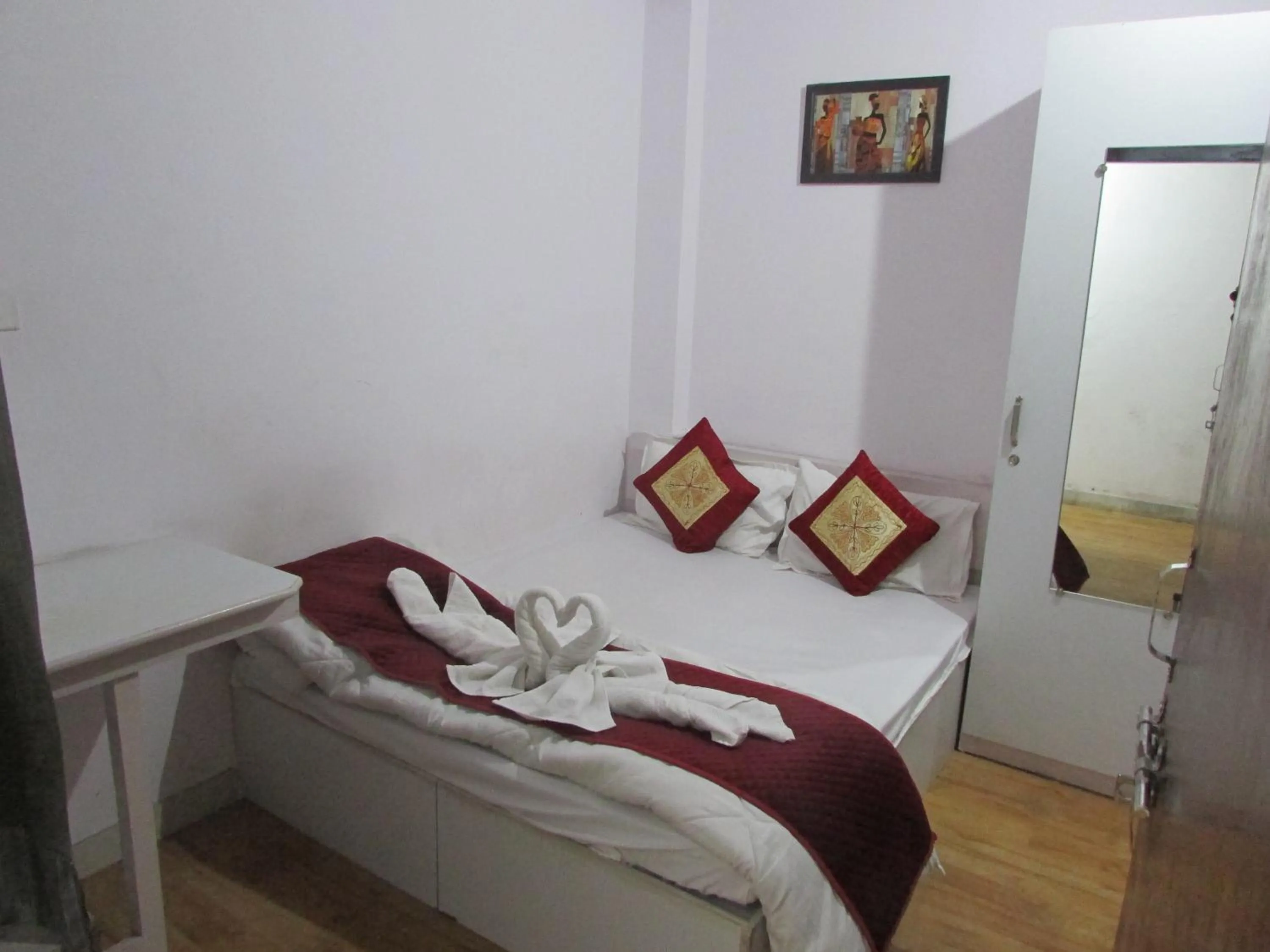 Bed in Ashish Guest House, Udaipole