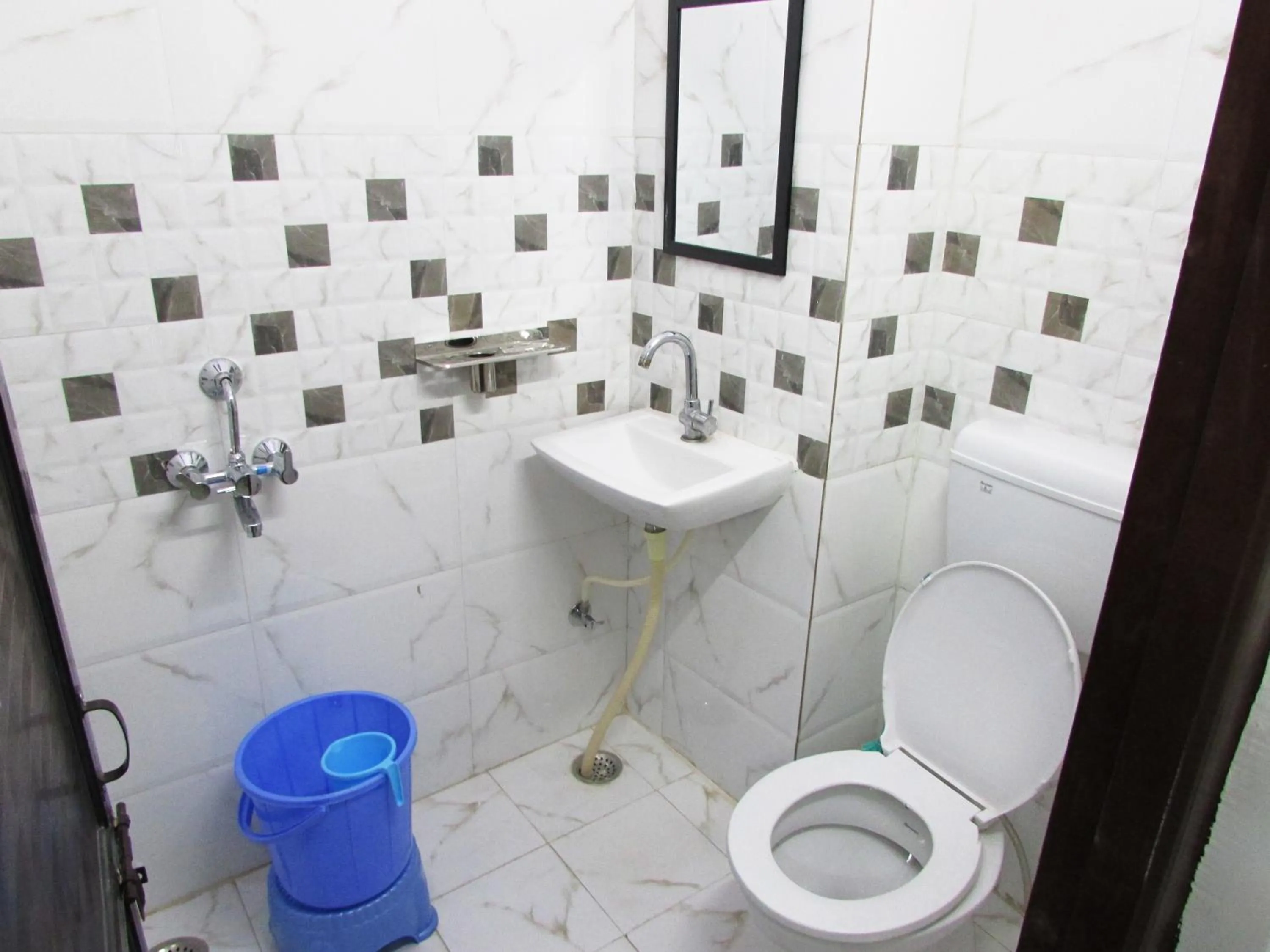 Bathroom in Ashish Guest House, Udaipole