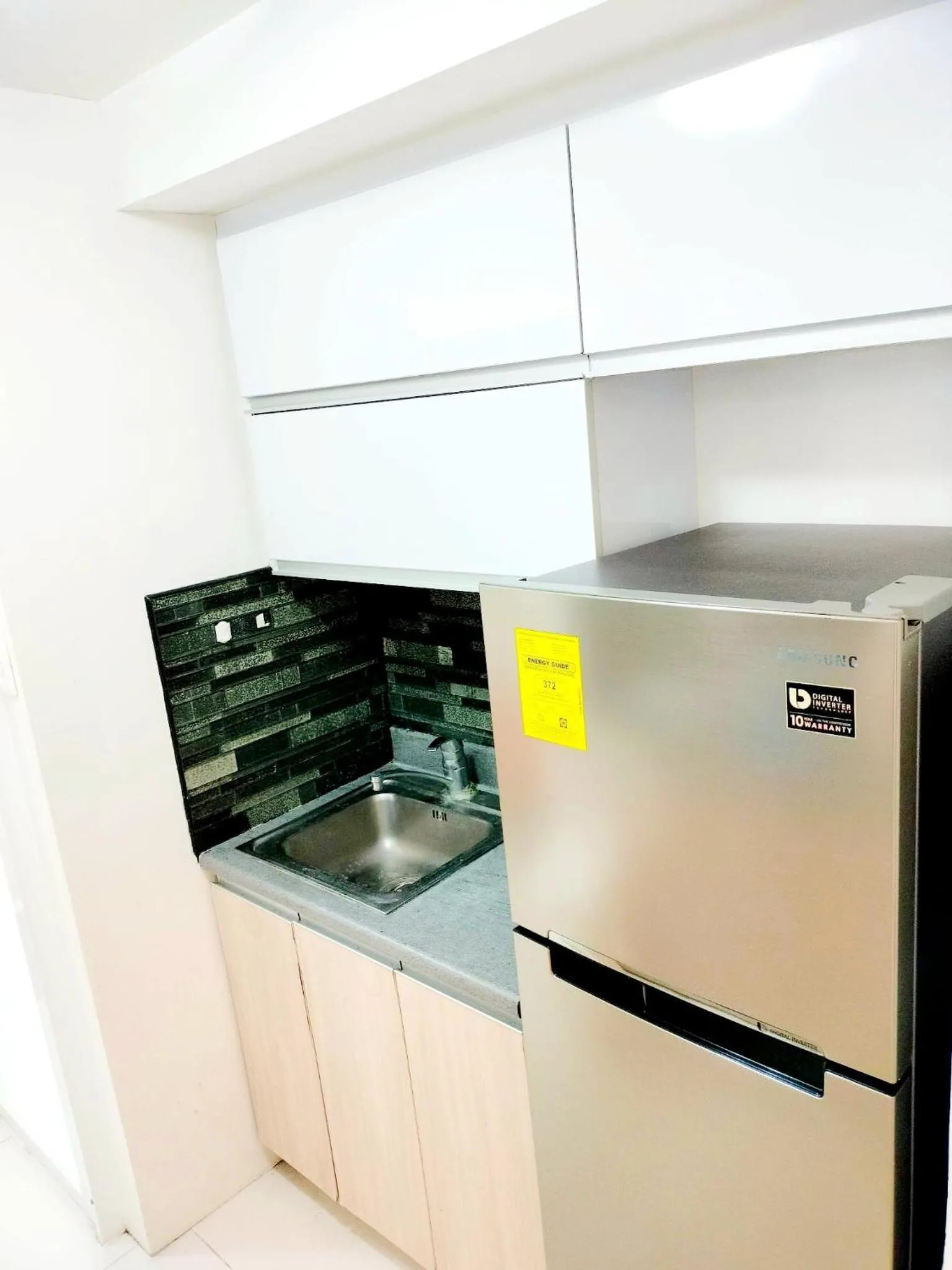 kitchen in The Levels 2BR Condo Fully Interior Cosmo Living
