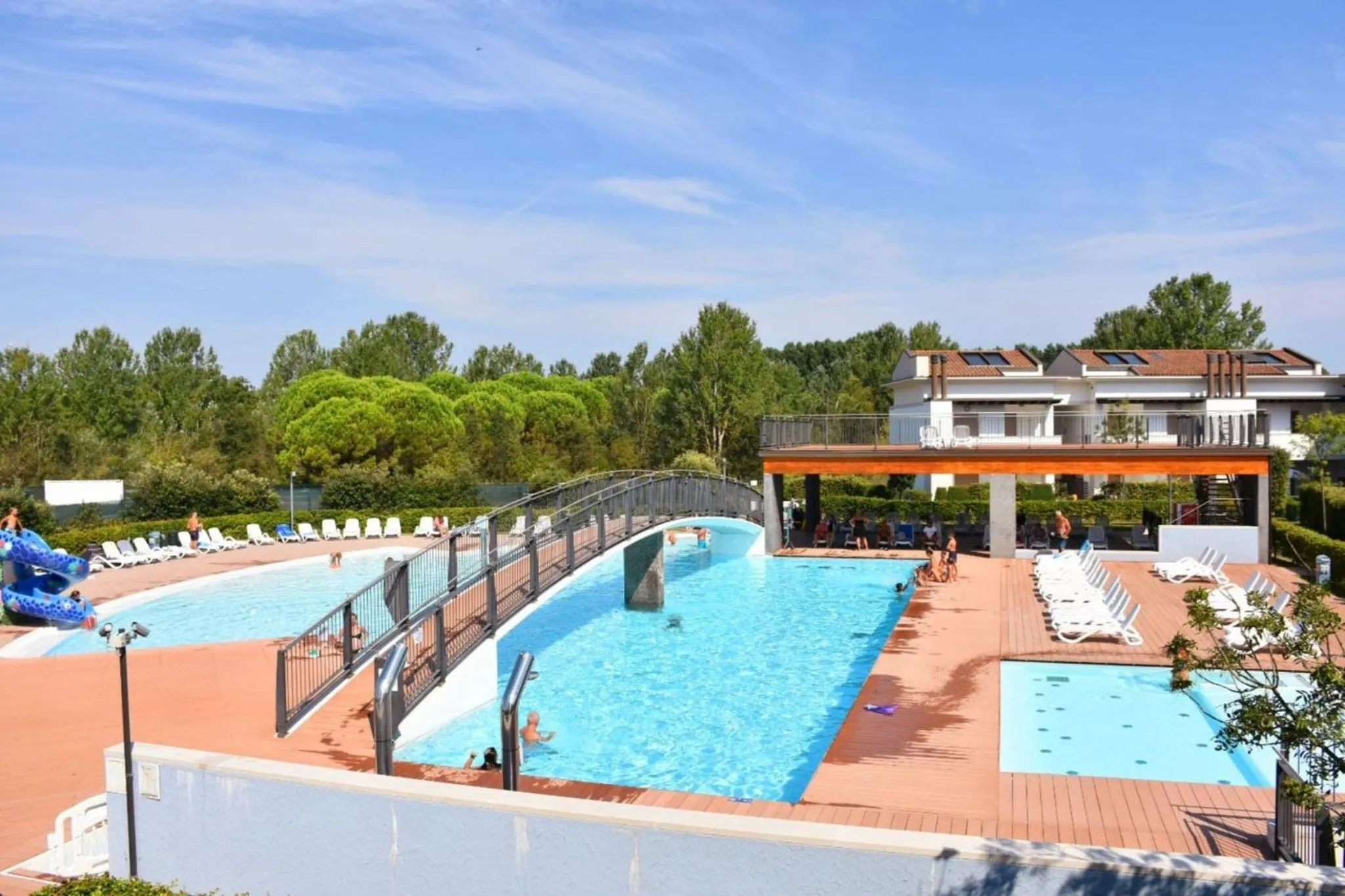 Bright fenced garden flat with swimming pool