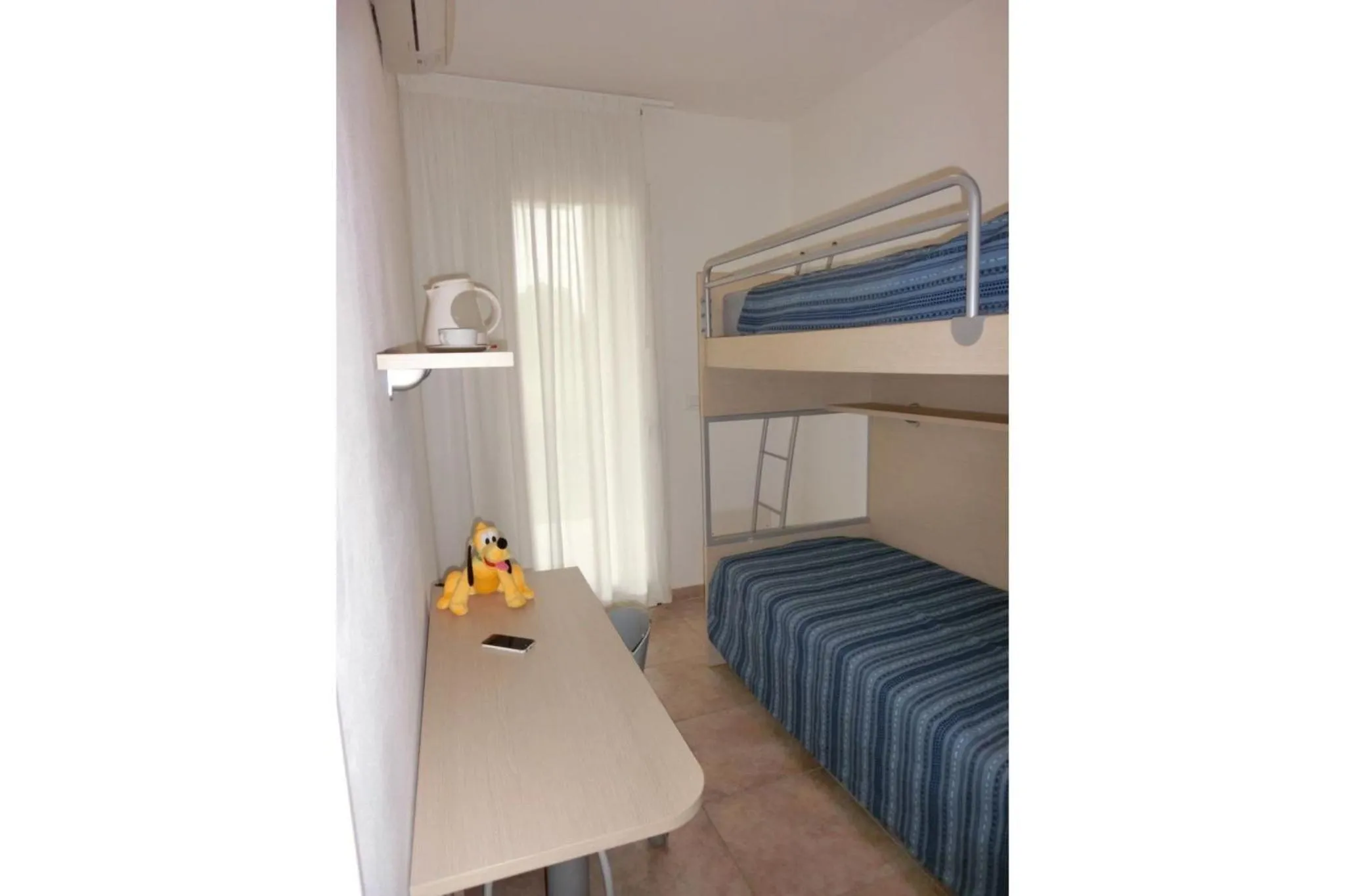 Bright fenced garden flat with swimming pool