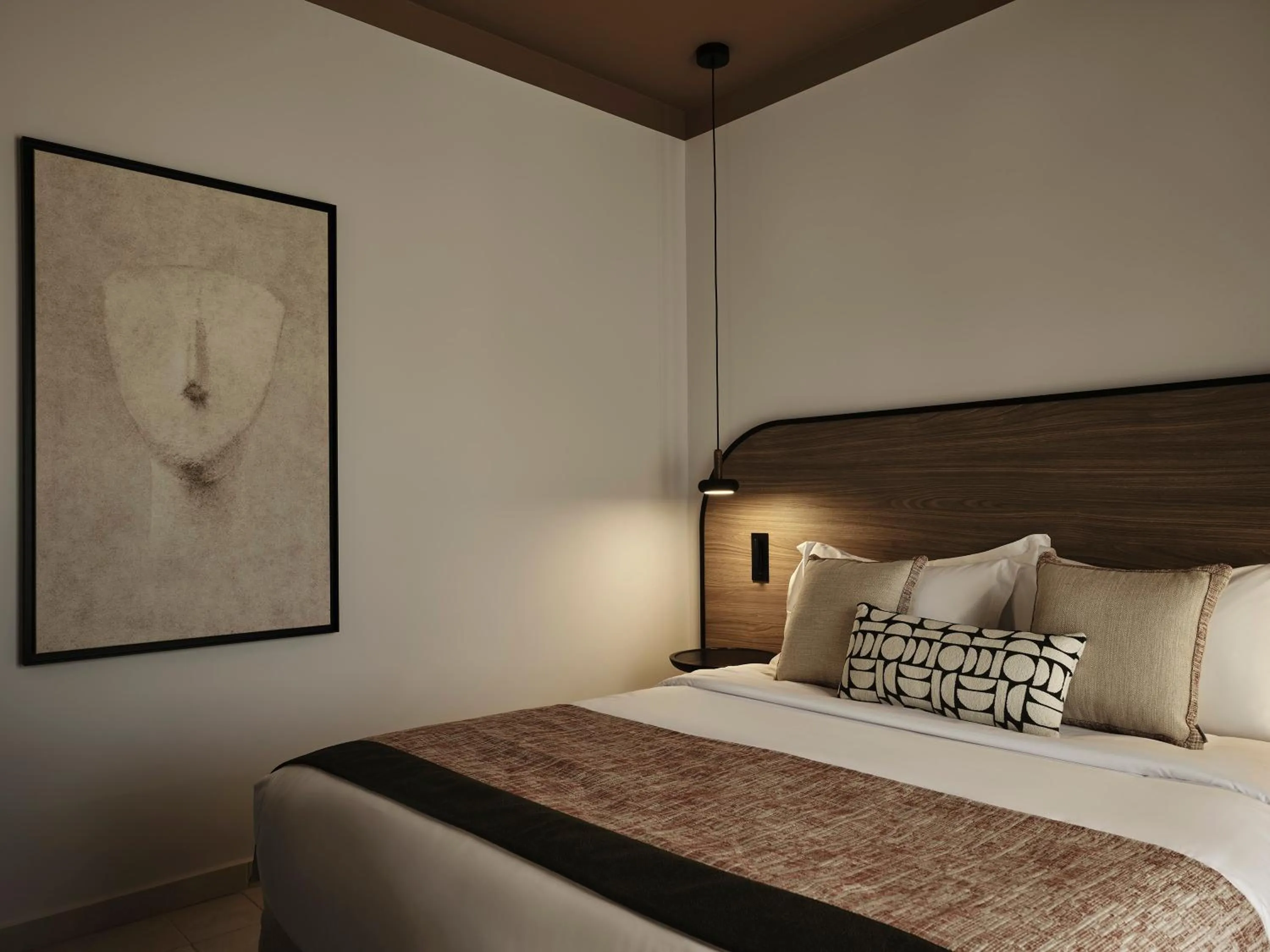 Bed in NAUMA PAROS Design Boutique Hotel