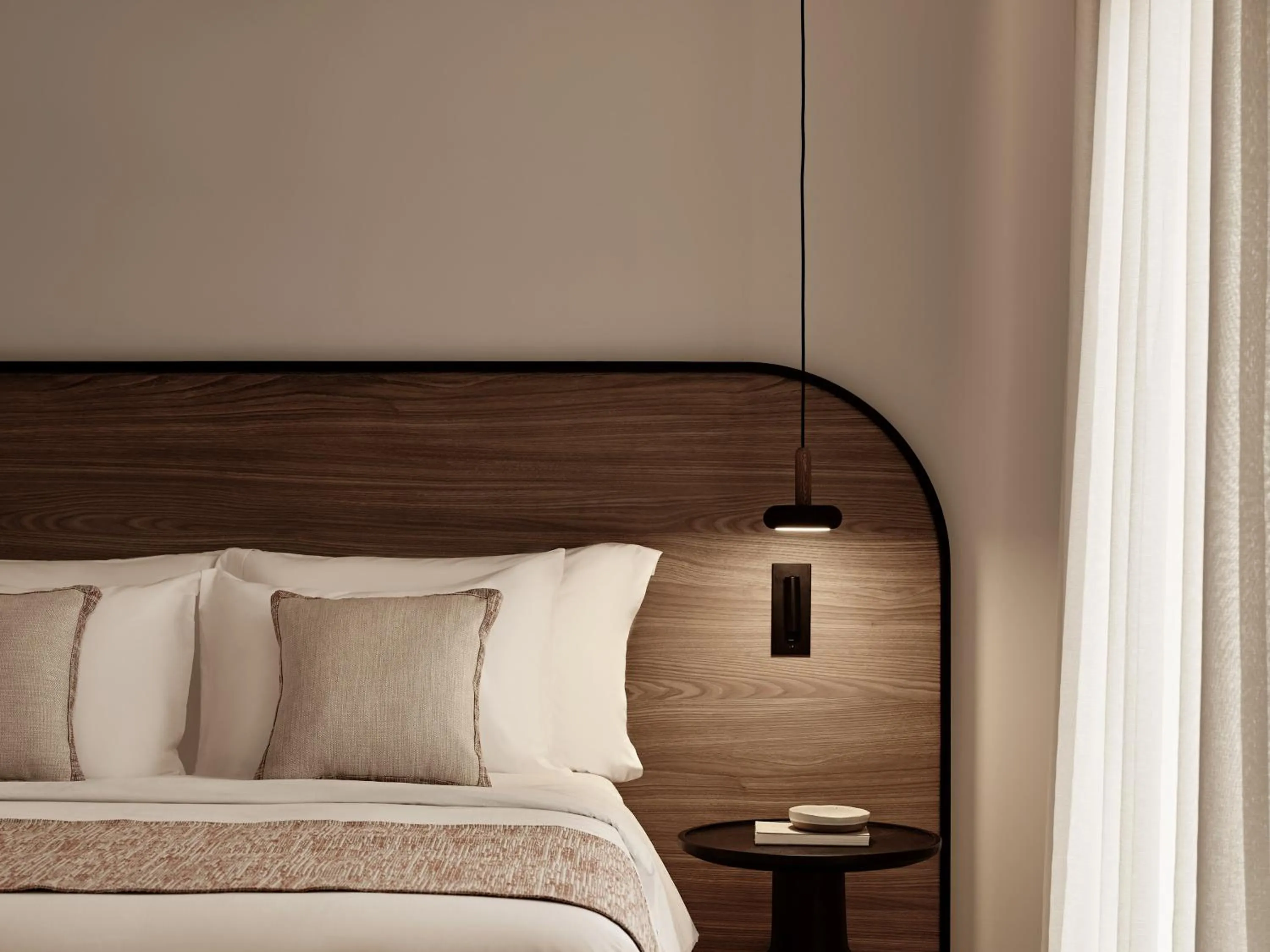 Bed in NAUMA PAROS Design Boutique Hotel
